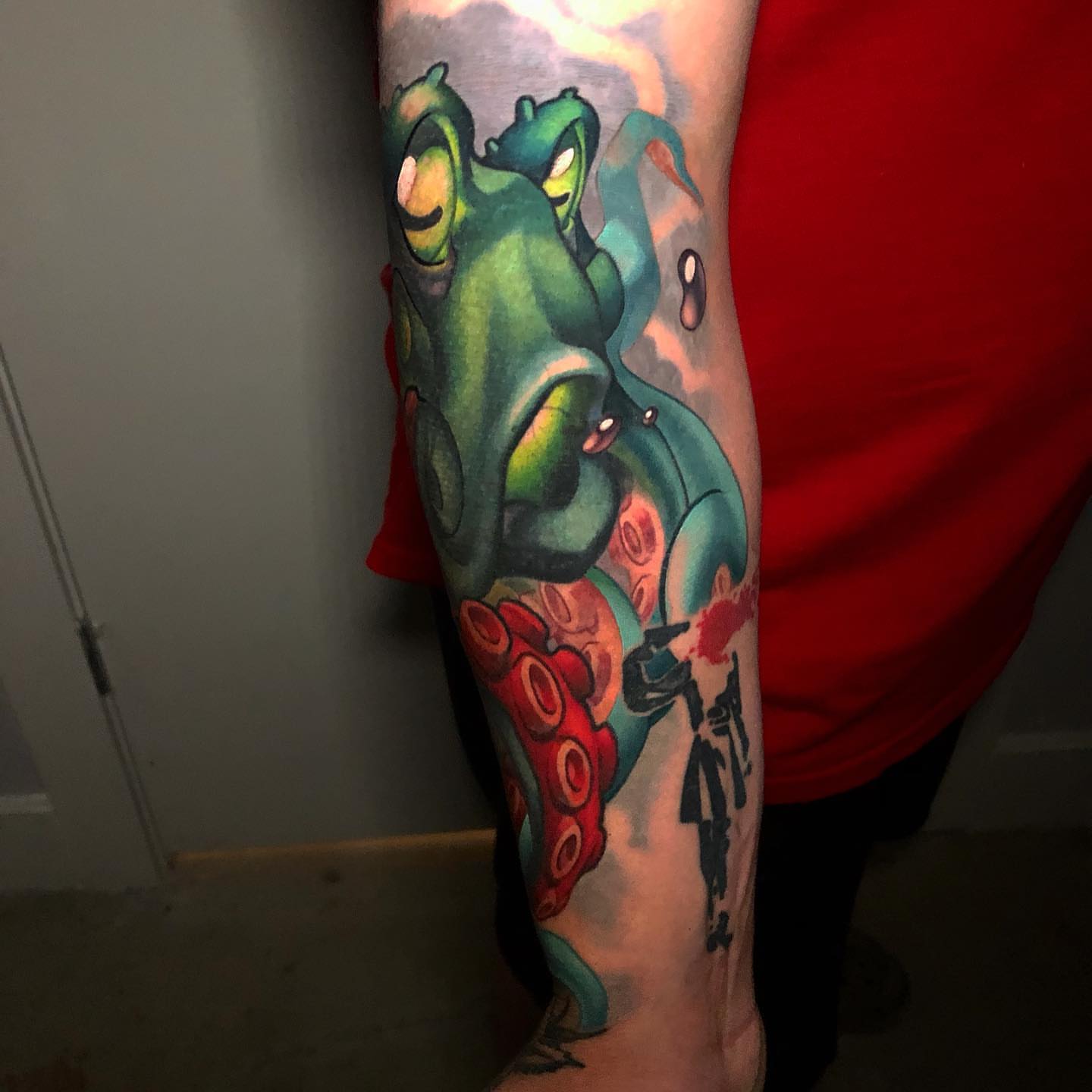 Octopus new school tattoo on the forearm by Tim Stafford