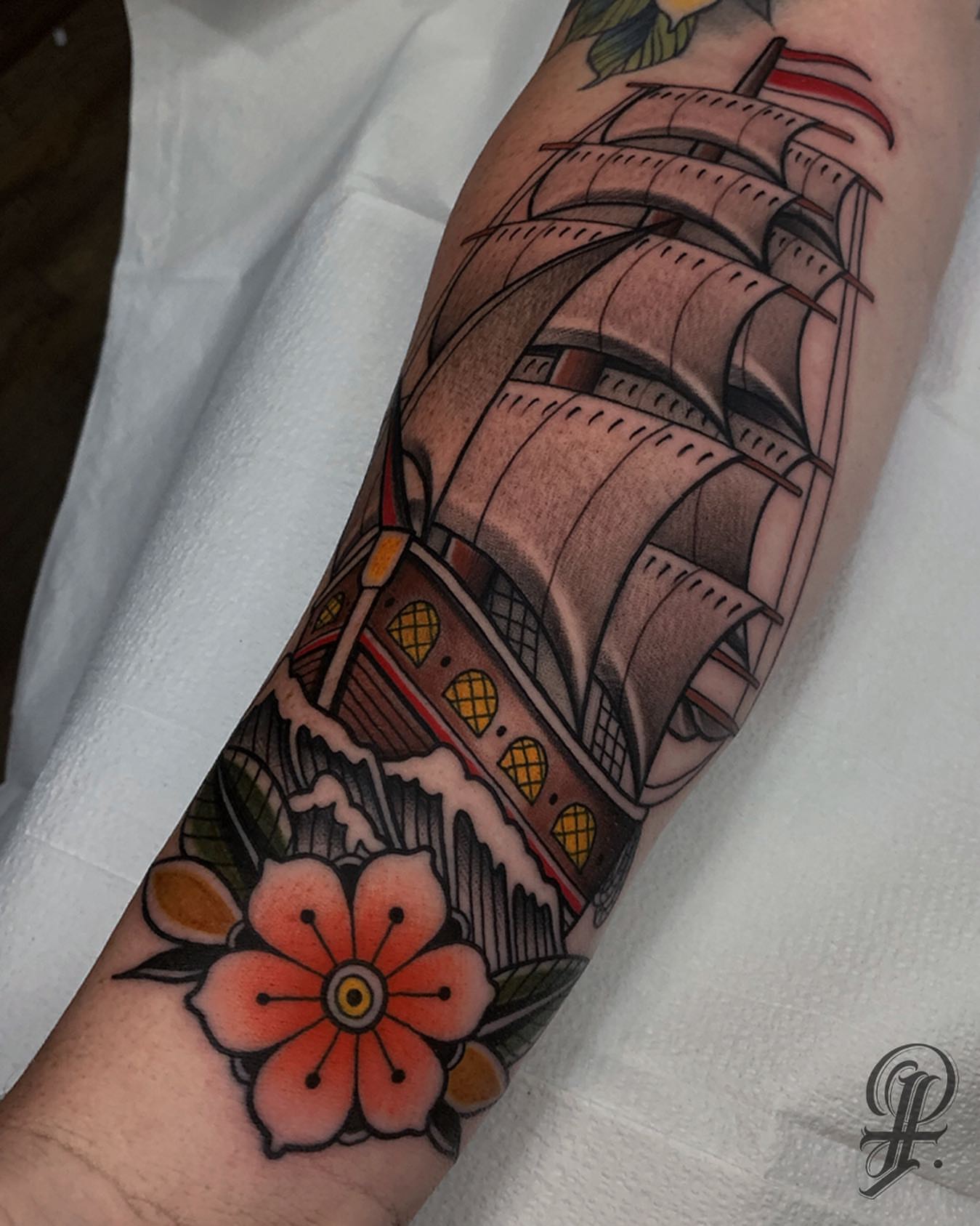 Ship and flower American traditional tattoo on the forearm by ๐ฃ๐๐๐ ๐๐ ๐ฆ๐๐๐ฉ๐