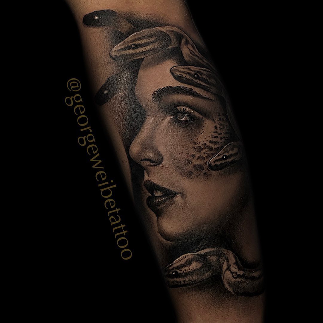 Woman with snakes realism tattoo on the forearm by George Weibe
