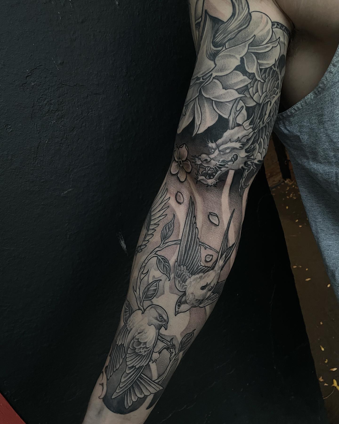 Birds and flowers realism tattoo on the forearm by Madelyn Roberts, Bellingham, Washington