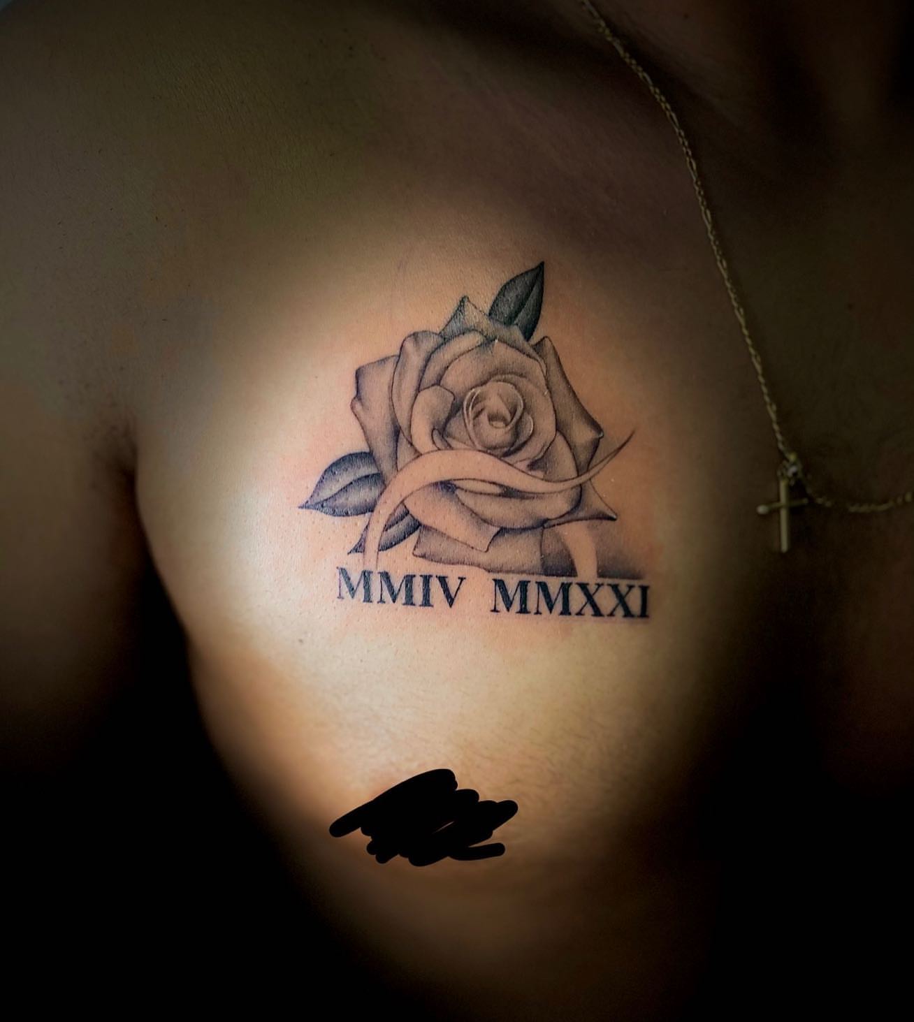 Rose black and grey tattoo on the chest by Cesar Nava