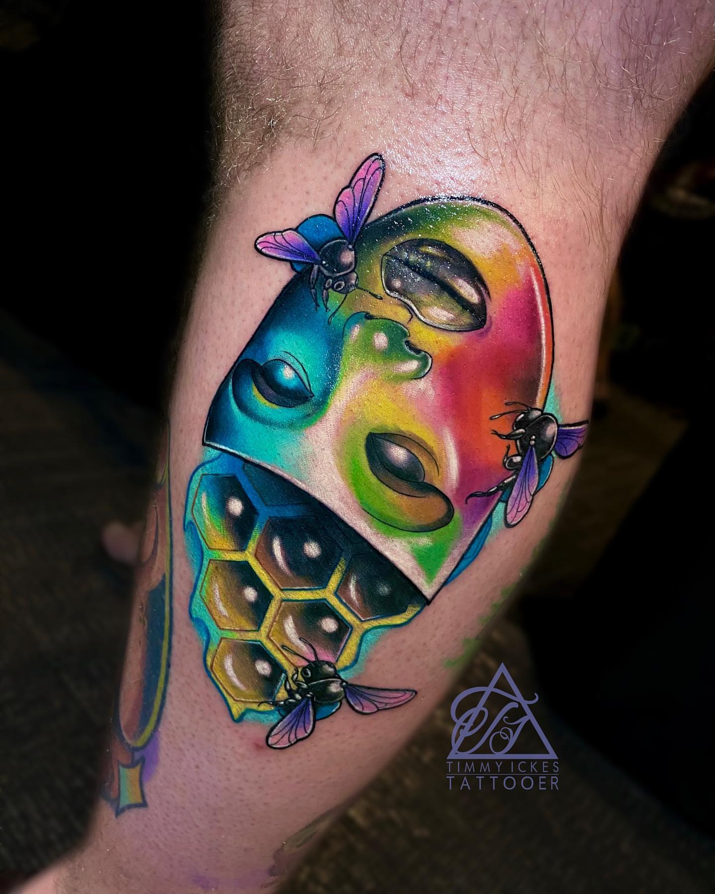 Bee and honeycomb new school tattoo on the forearm by Timmy Ickes