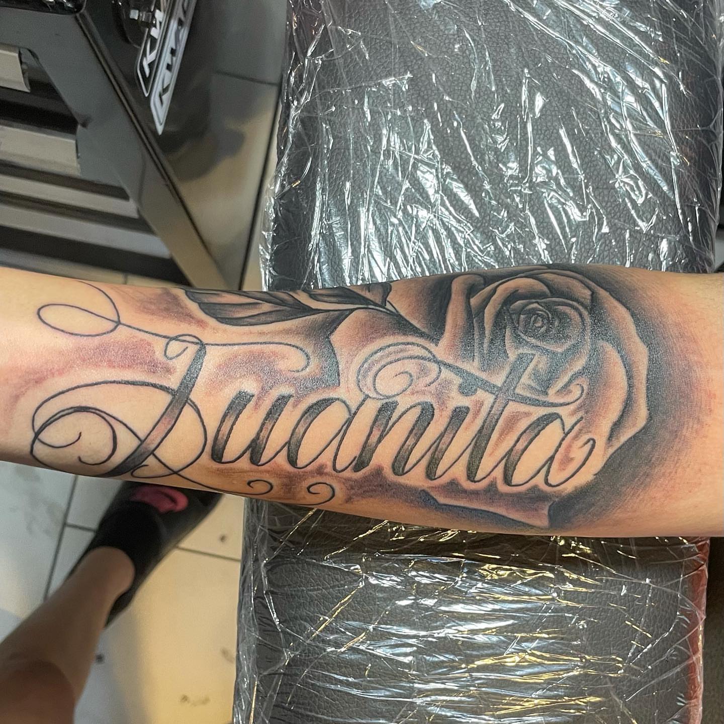 Juanita lettering script tattoo on the forearm by Desirae✨