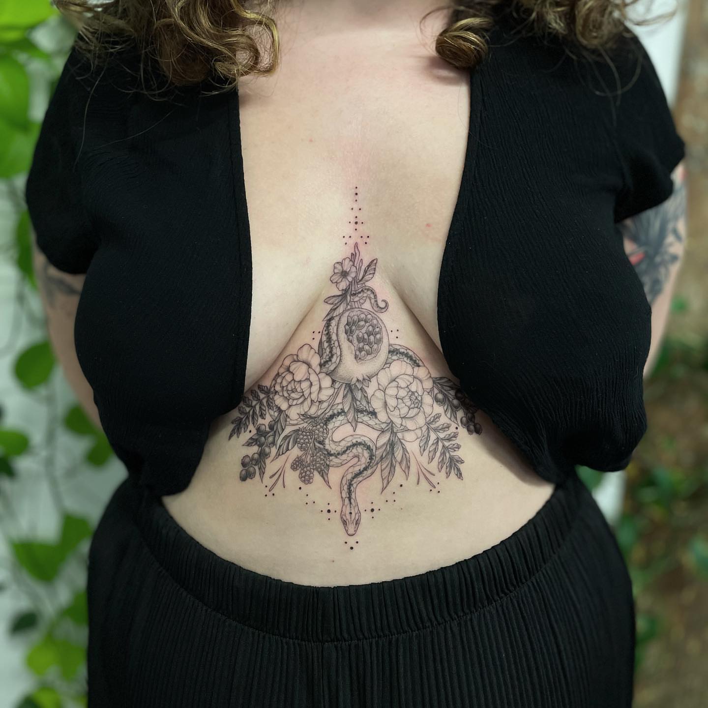 Snake and floral arrangement dotwork tattoo on the back by @jettaturas, New City, New York