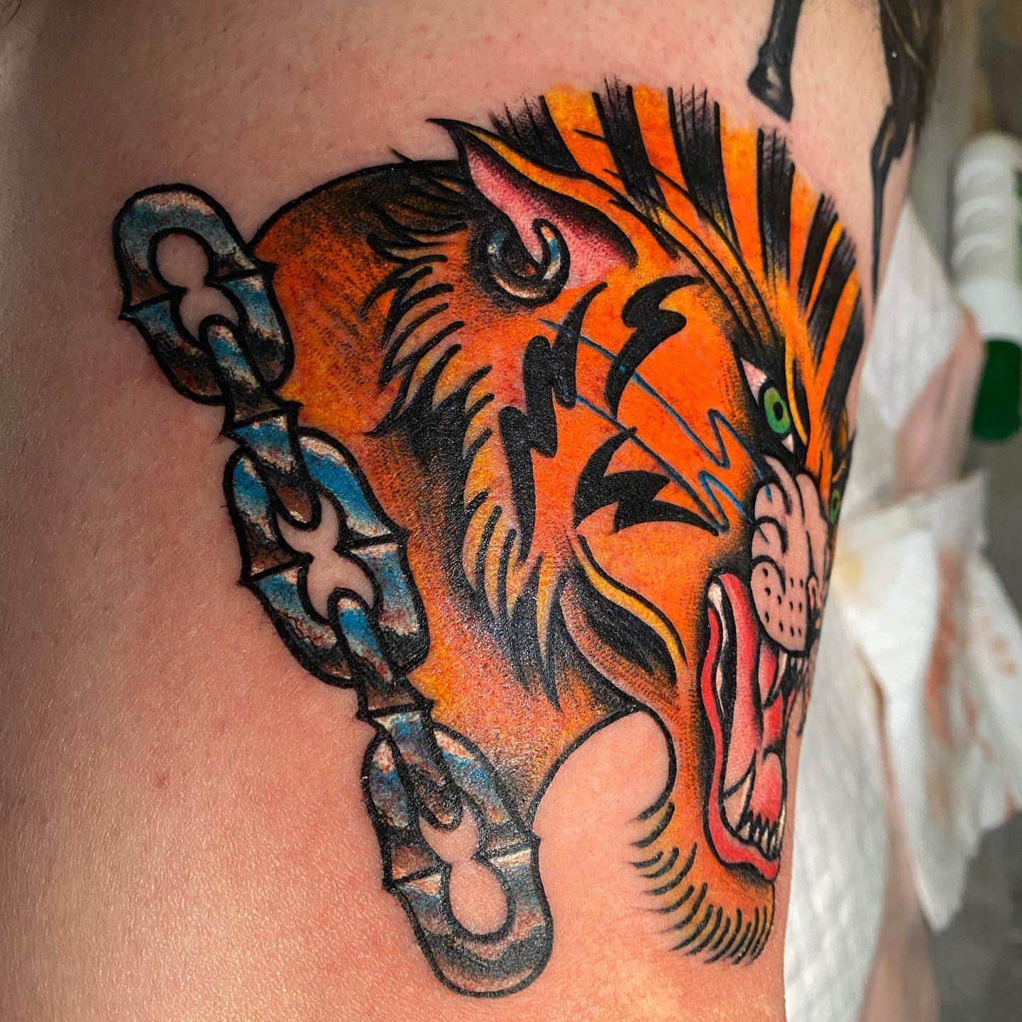 Tiger American traditional tattoo on the thigh by Jenni Hand - Tattoo, Maryville, Tennessee