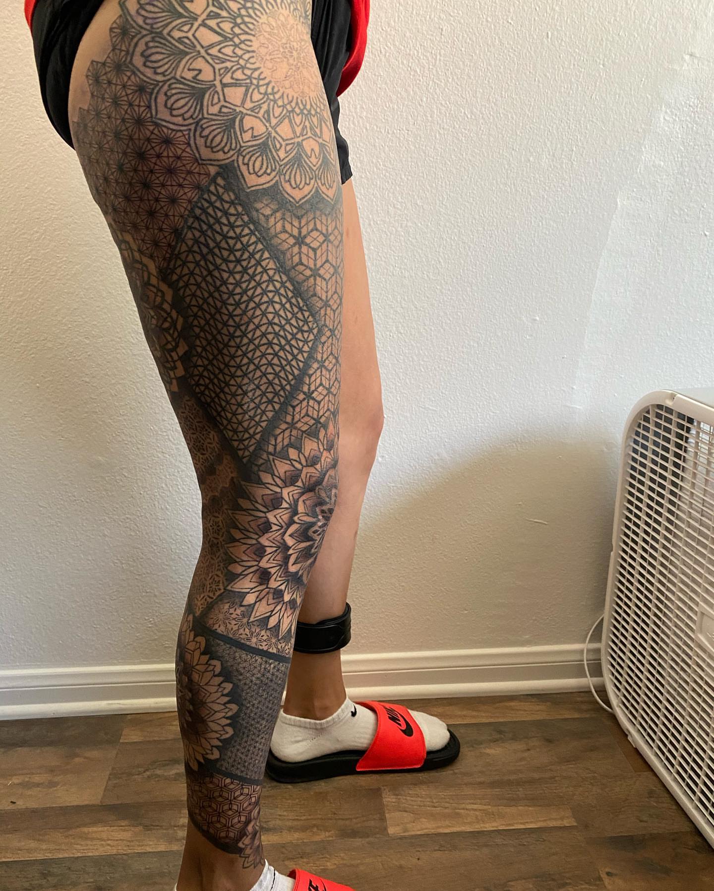Geometric mandala geometric tattoo on the leg by Nicholas Jones