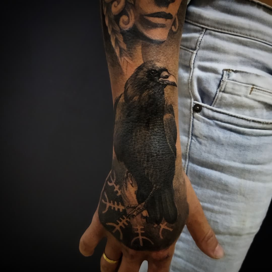 Crow realism tattoo on the hand by Marquin π§π·