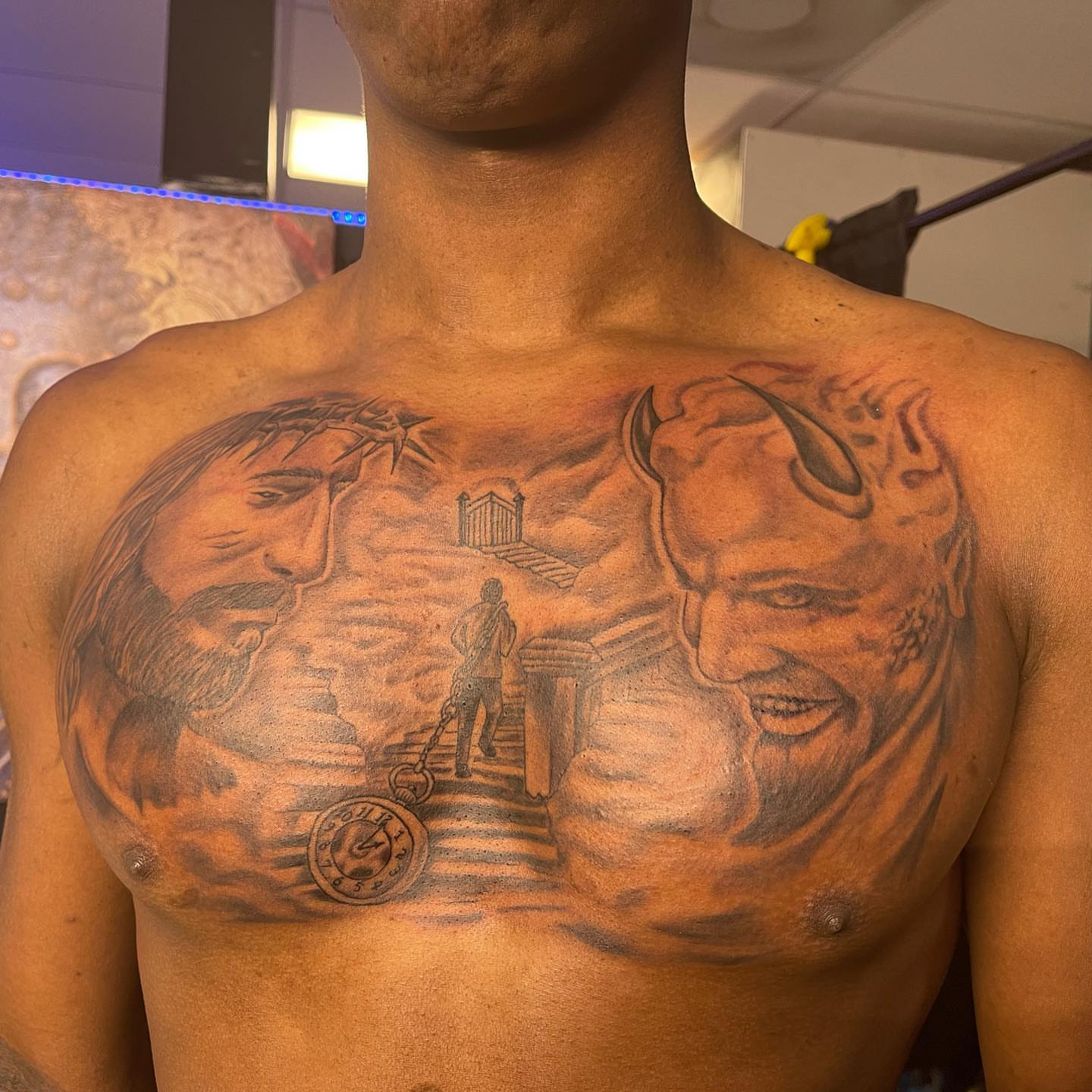 Religious scene realism tattoo on the chest by pecous