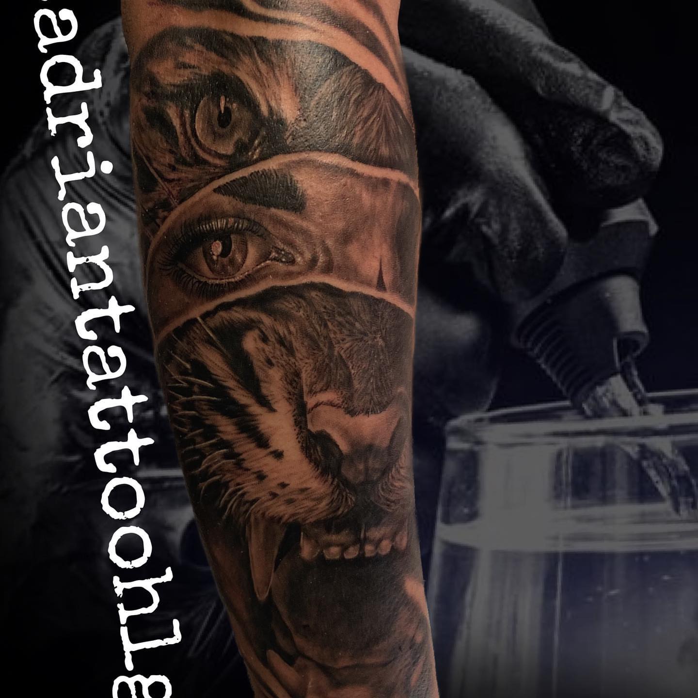 Eye and tiger realism tattoo on the forearm by Adrian Gonzalez