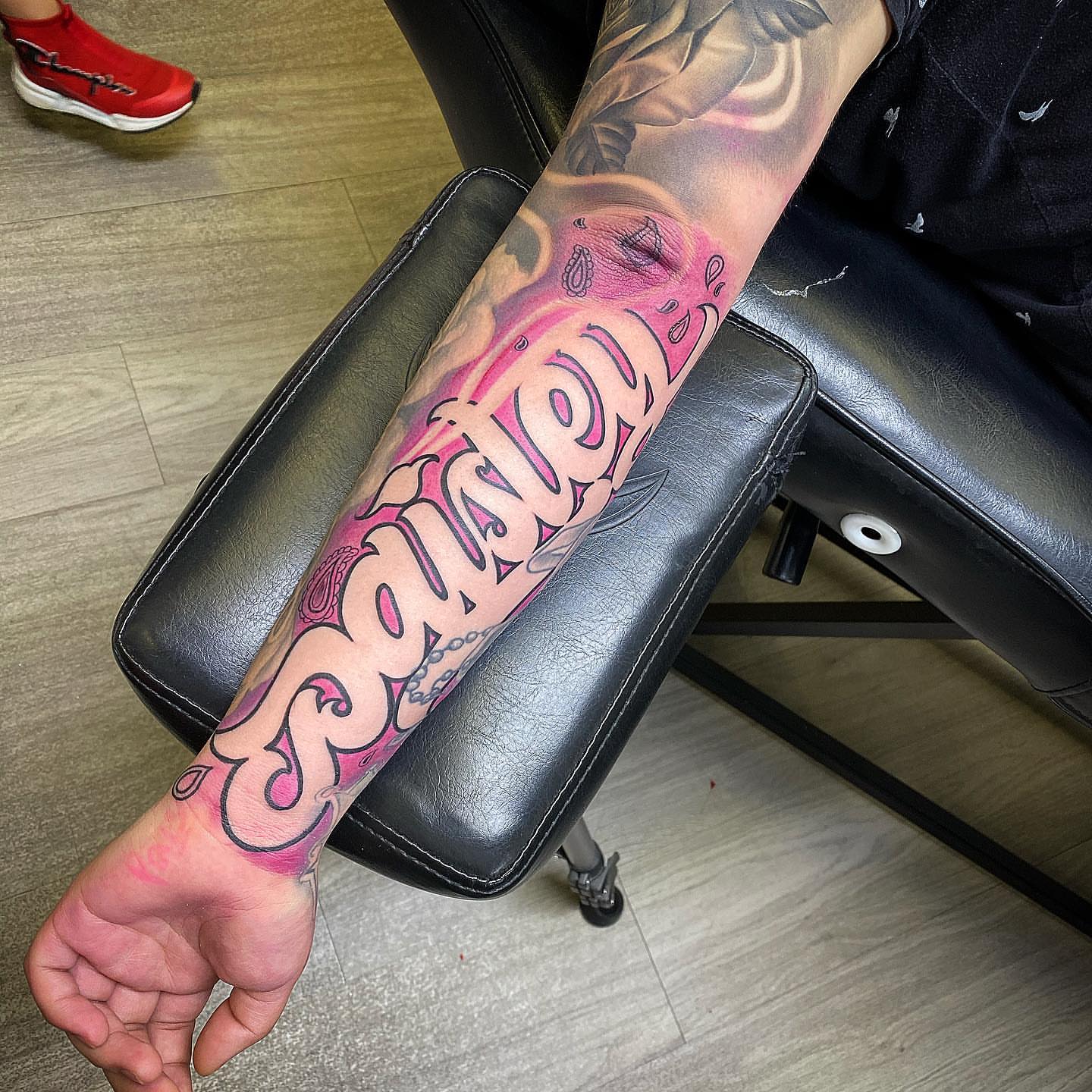 Name tattoo lettering script tattoo on the forearm by TattsByShorty