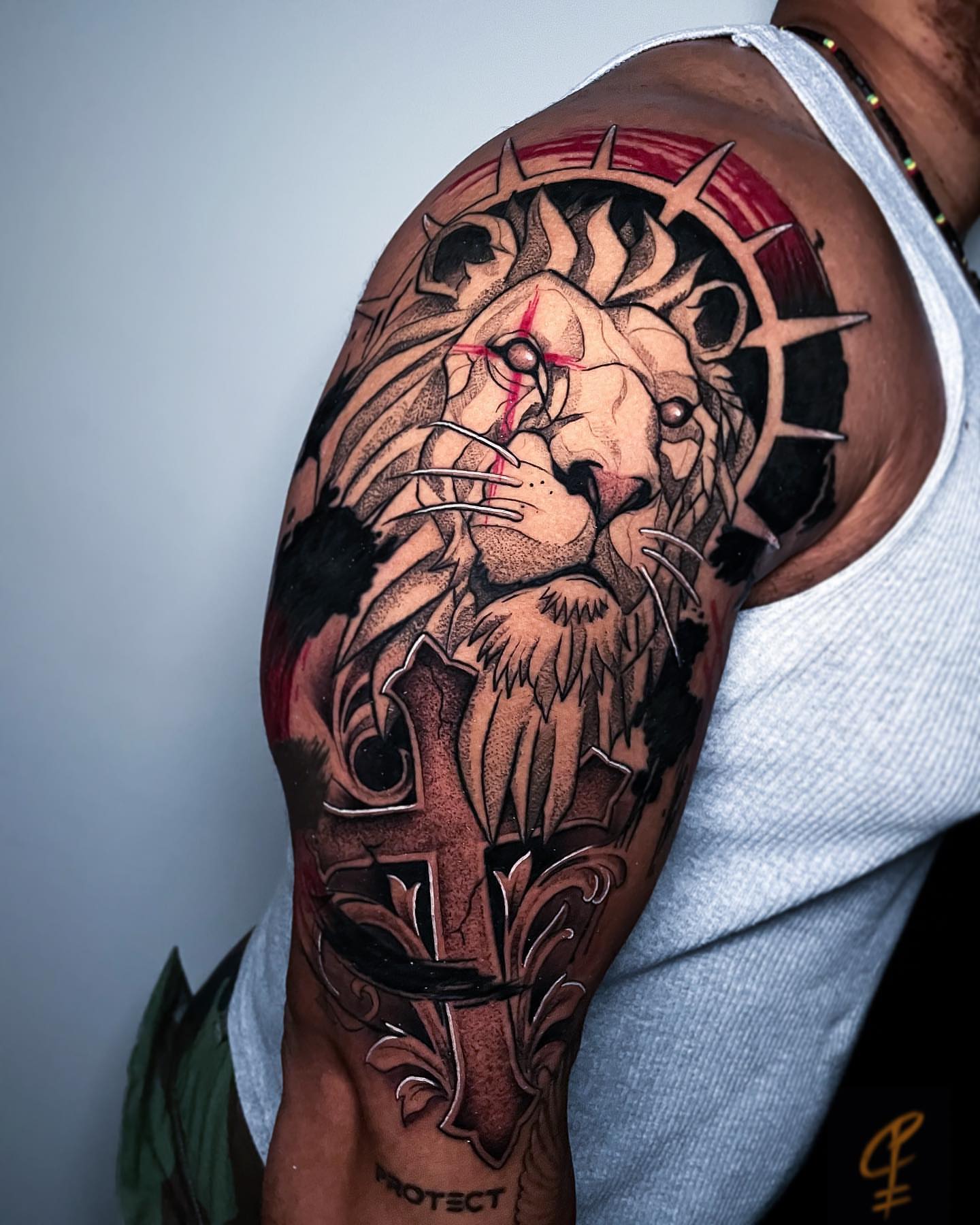 Lion realism tattoo on the shoulder by Christian Pelaez