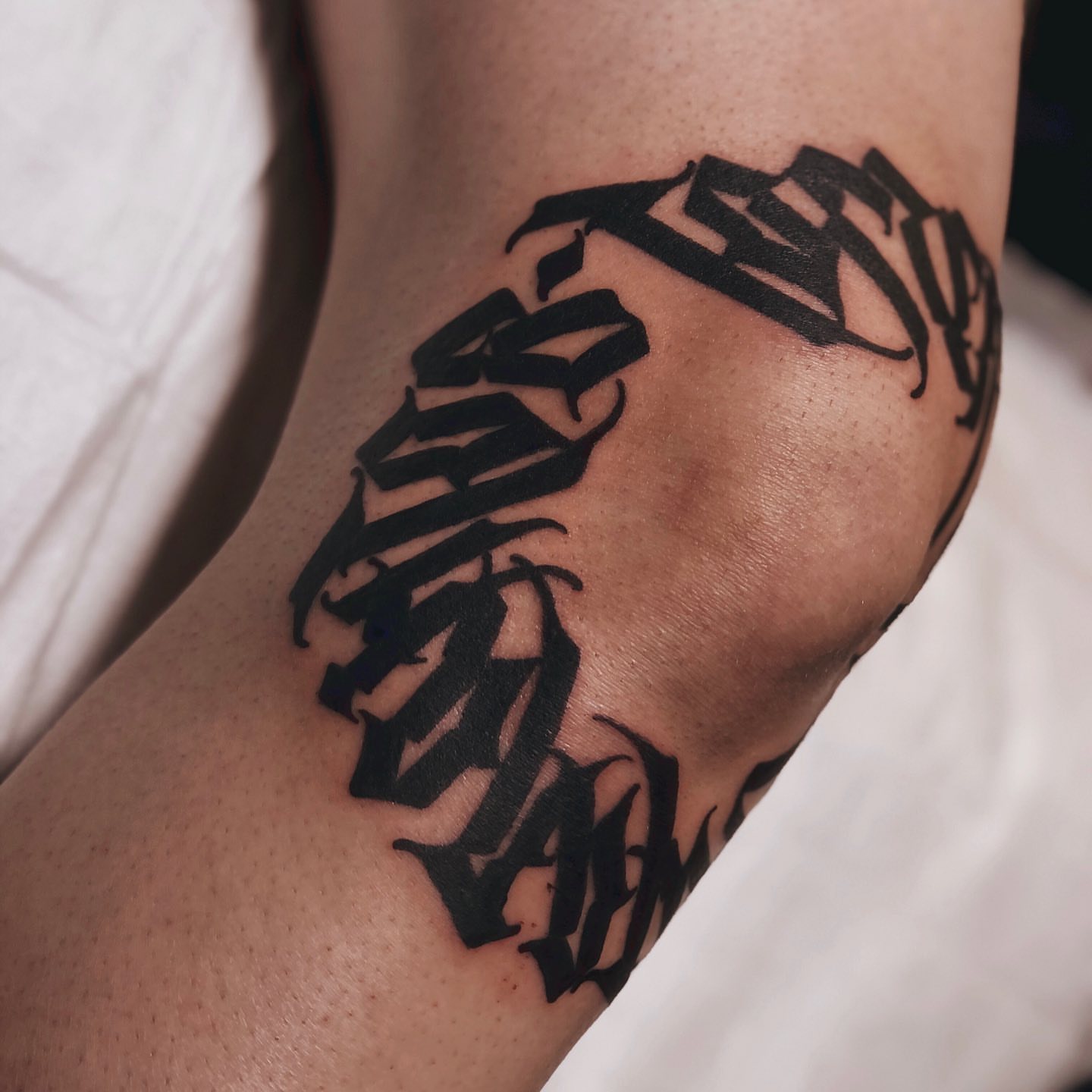 Script lettering lettering script tattoo on the upper arm by Zlata