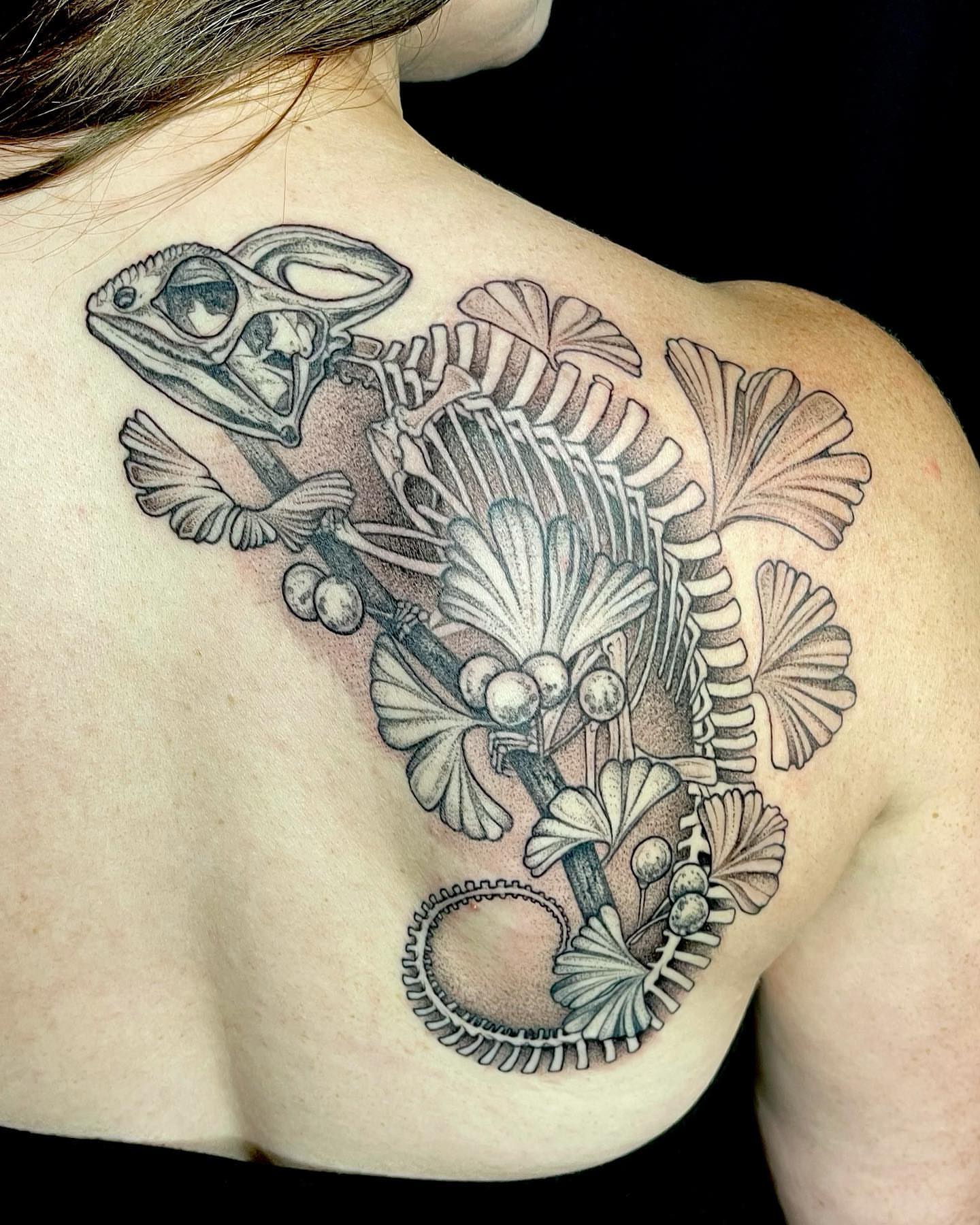 Lizard skeleton geometric tattoo on the back by Ruby Gore, Portland, Oregon