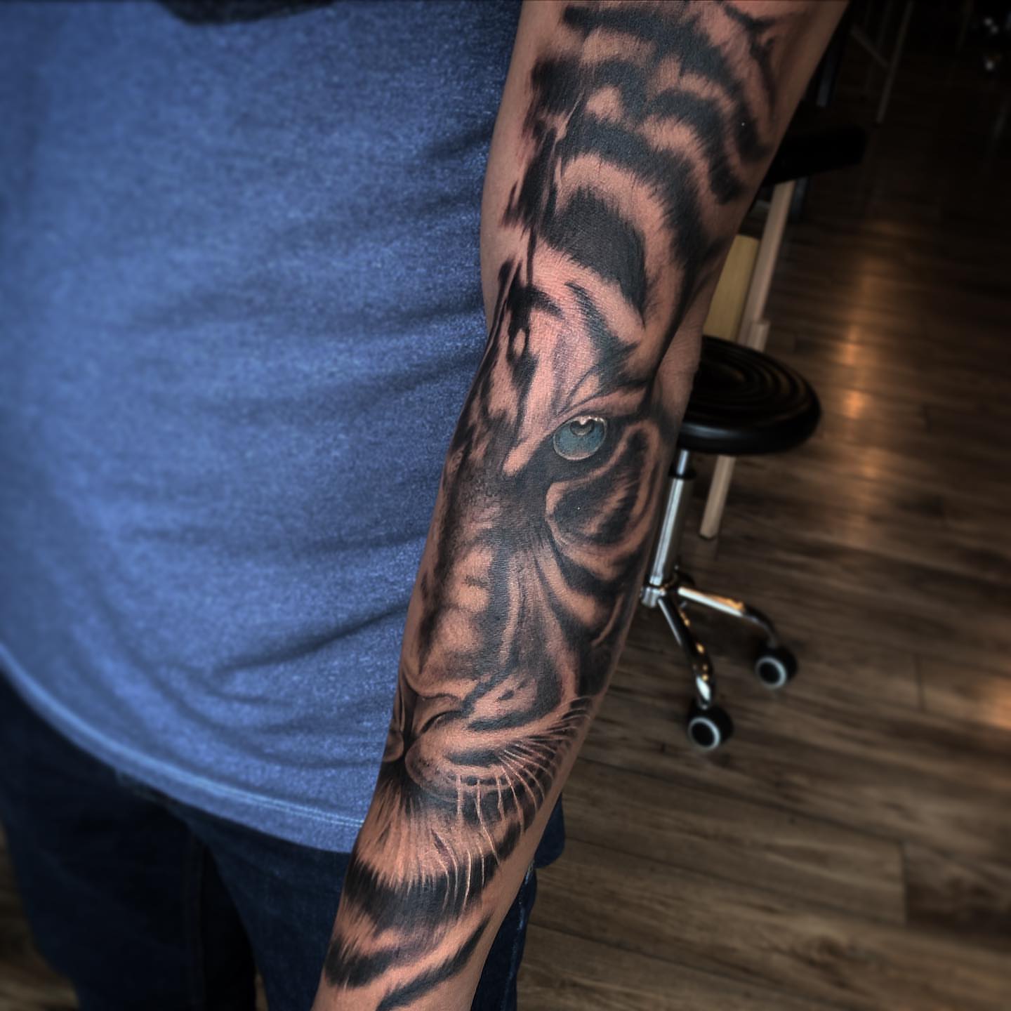 Lion realism tattoo on the forearm by ⠀⠀ ⠀ ⠀ ⠀⠀ ⠀⠀ ⠀⠀ ⠀ ⠀⠀ ⠀⠀ᎪᎳᏃ, West Hollywood, California
