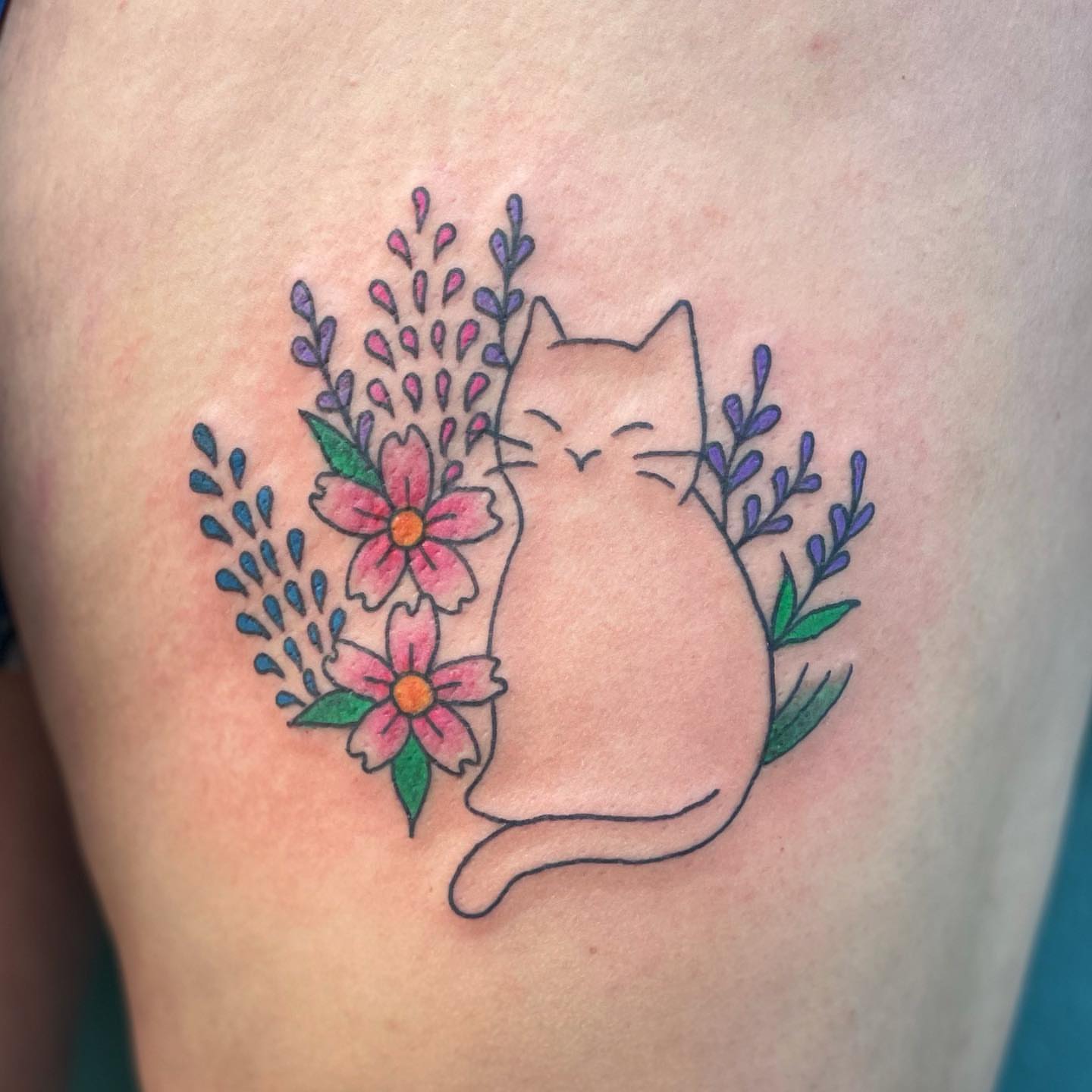 Cat and flowers dotwork tattoo on the thigh by Erin Stephens