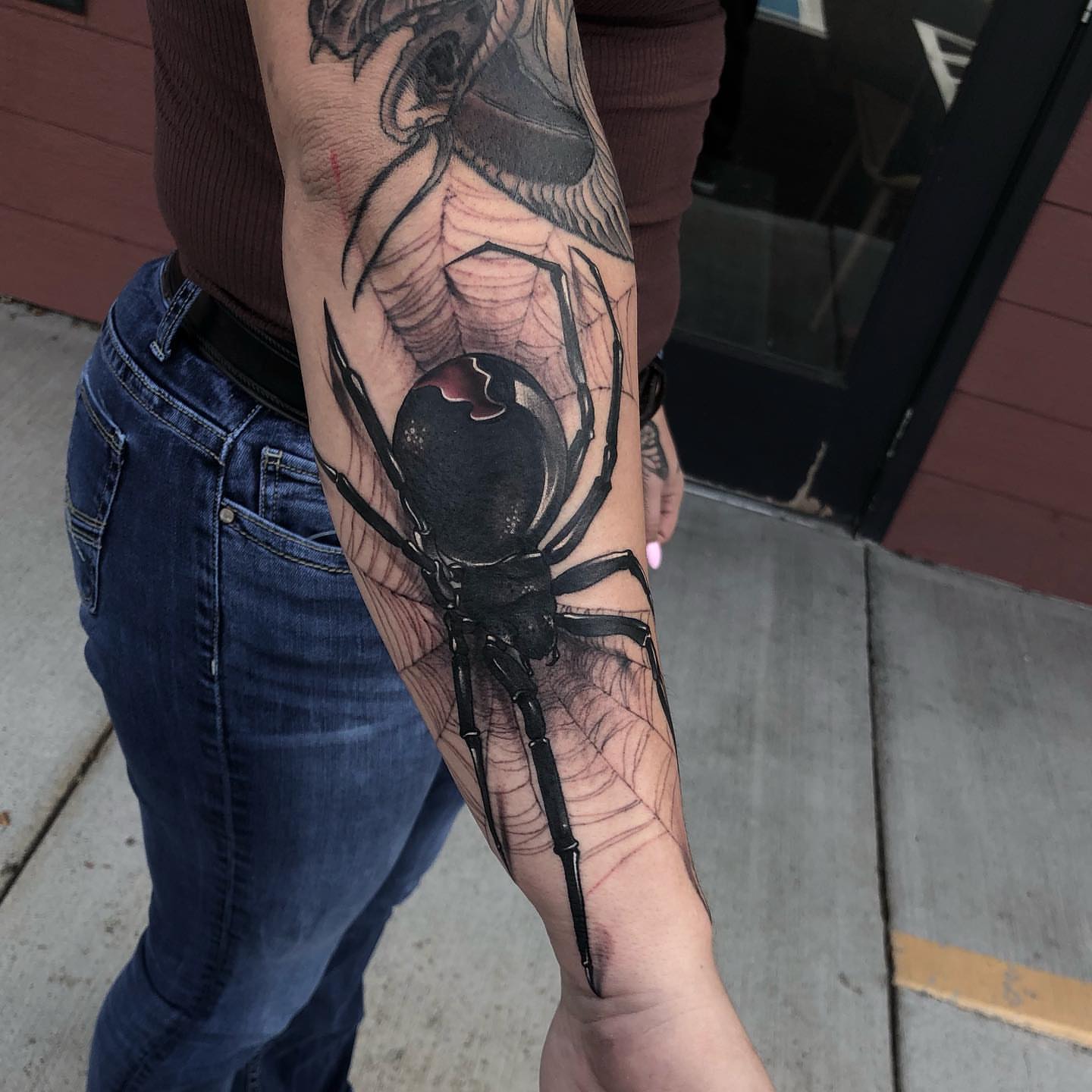 Spider realism tattoo on the forearm by Aaron Borden