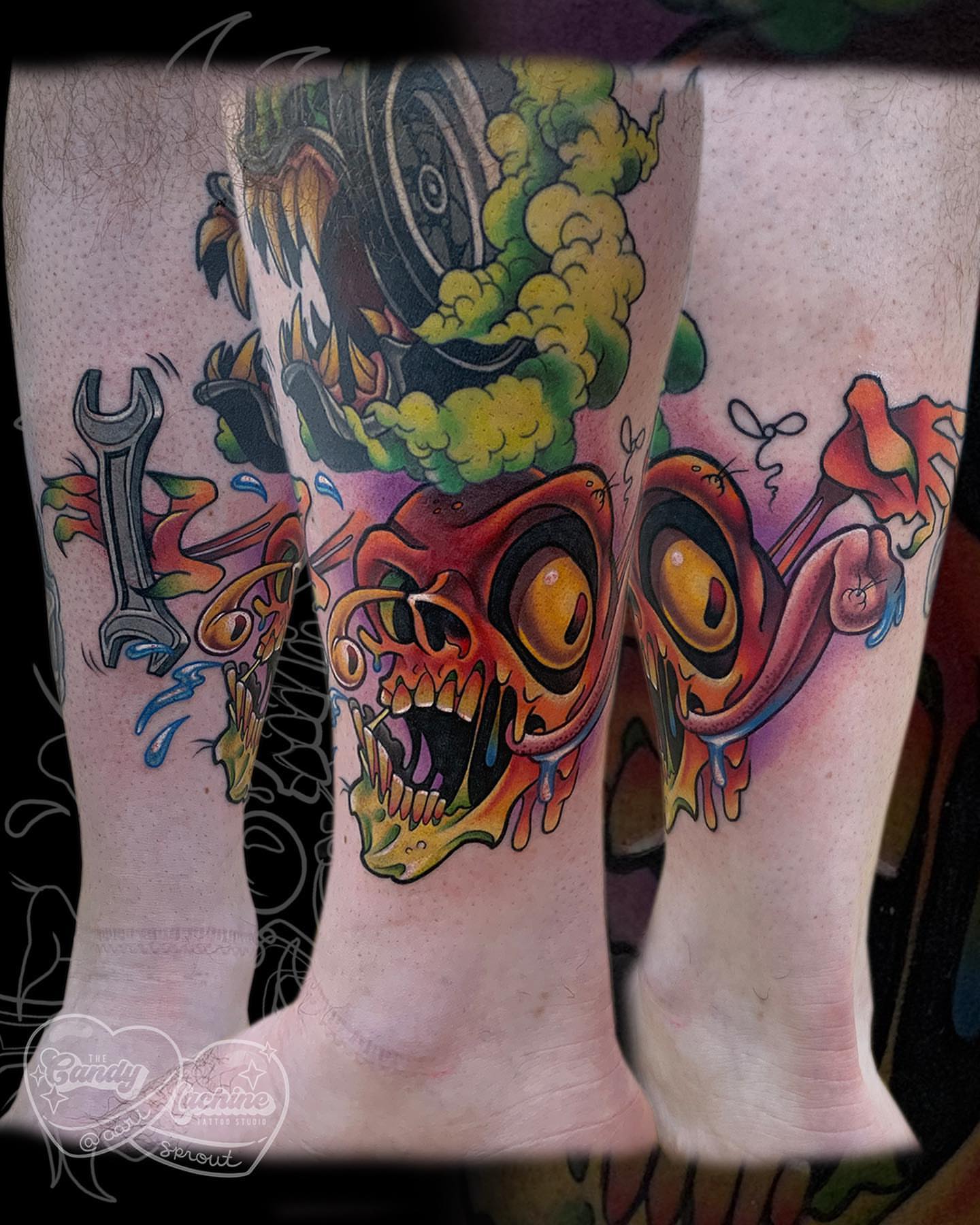 Skull with mechanical elements new school tattoo on the calf by Ariel Robinson