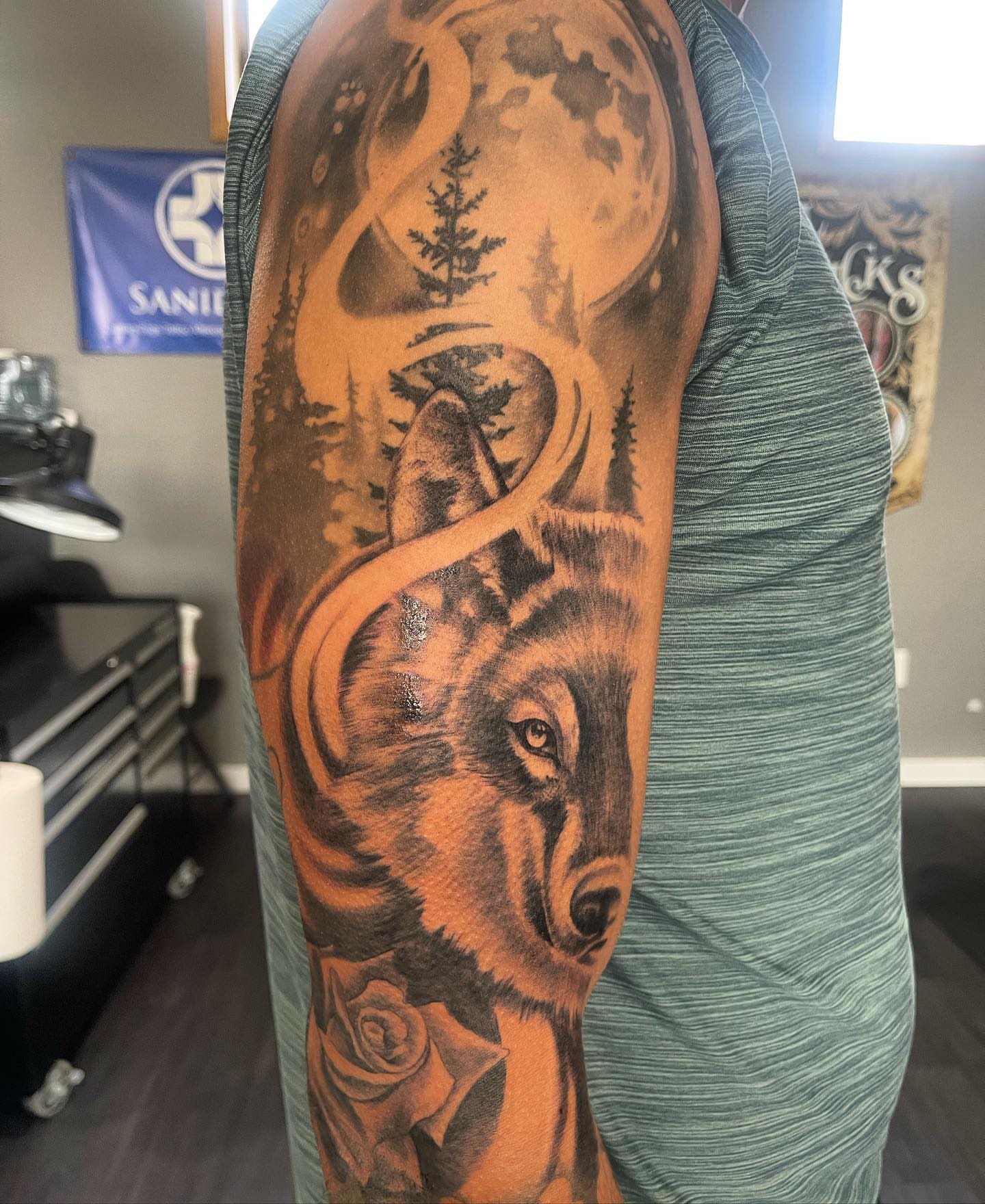 Wolf realism tattoo on the forearm by Paul Hicks