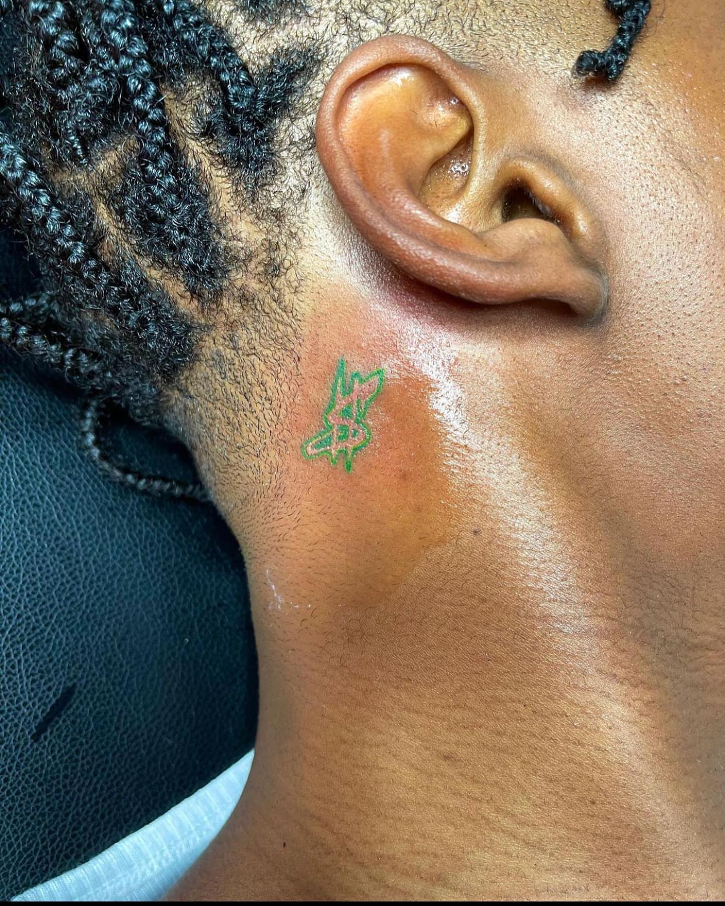 Dollar sign dotwork tattoo on the neck by InkByChing❤️🔥