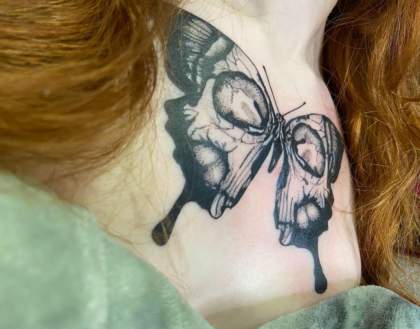 Butterfly dotwork tattoo on the shoulder by Daphne Landry