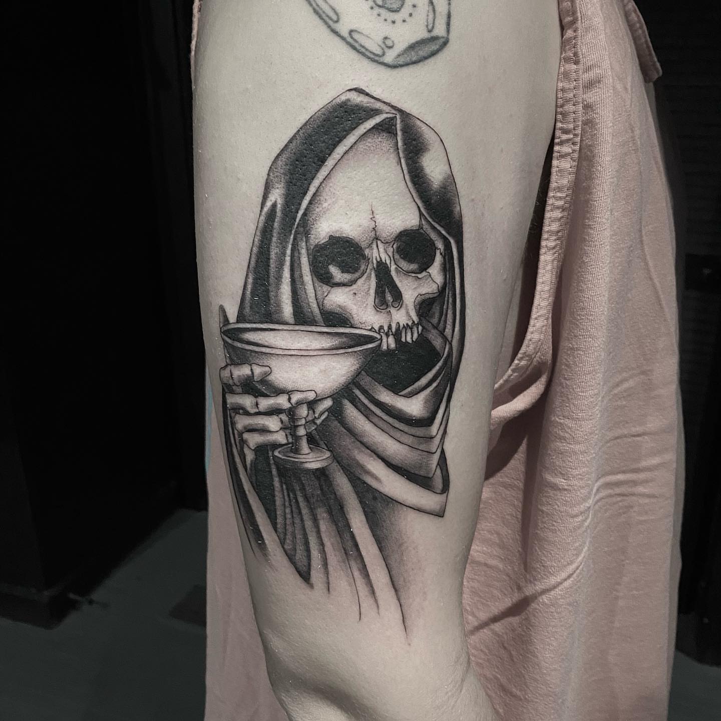 Reaper drinking realism tattoo on the forearm by Sam Fortney, Columbus, Ohio