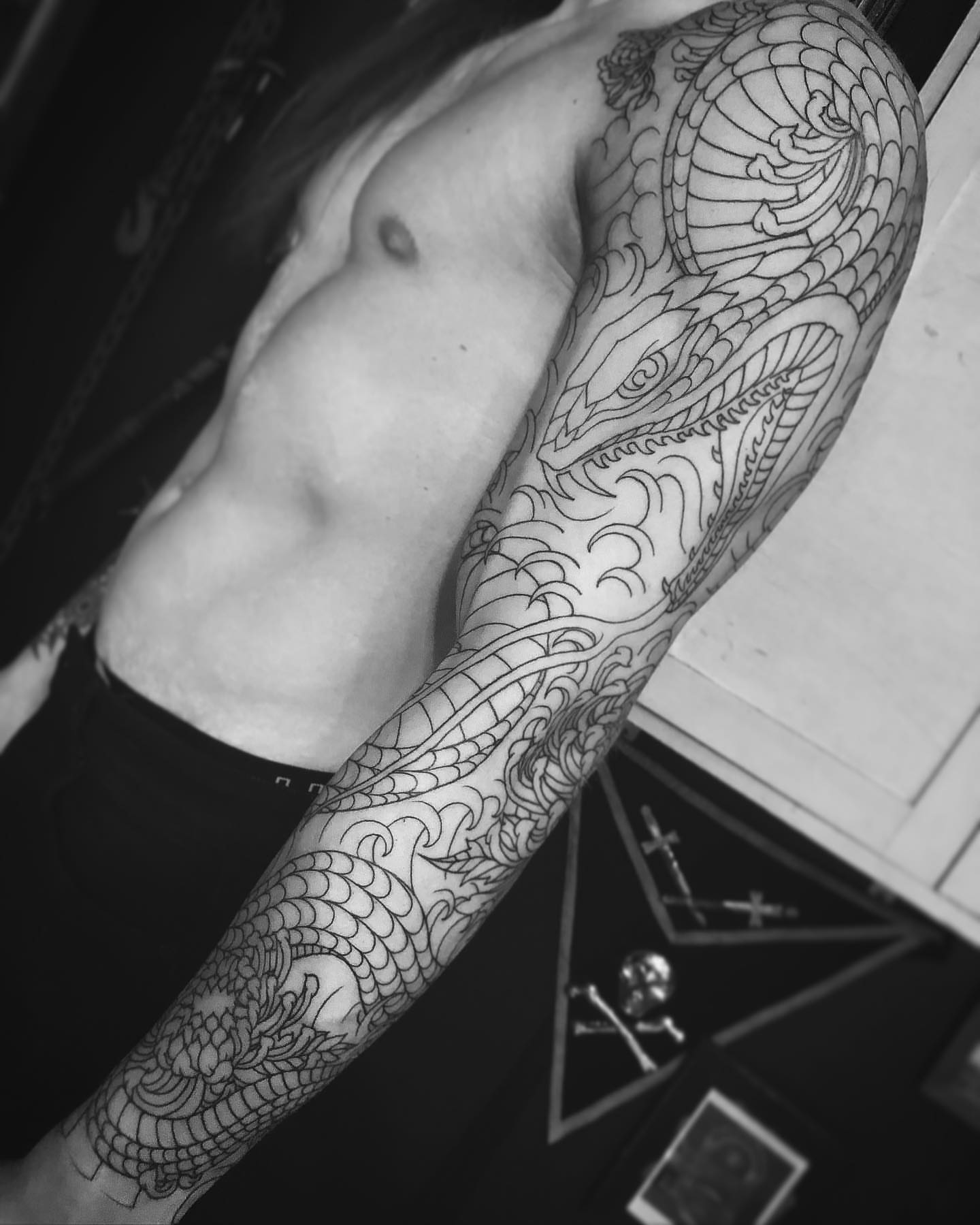 Dragon black and grey tattoo on the forearm by Jay Breen