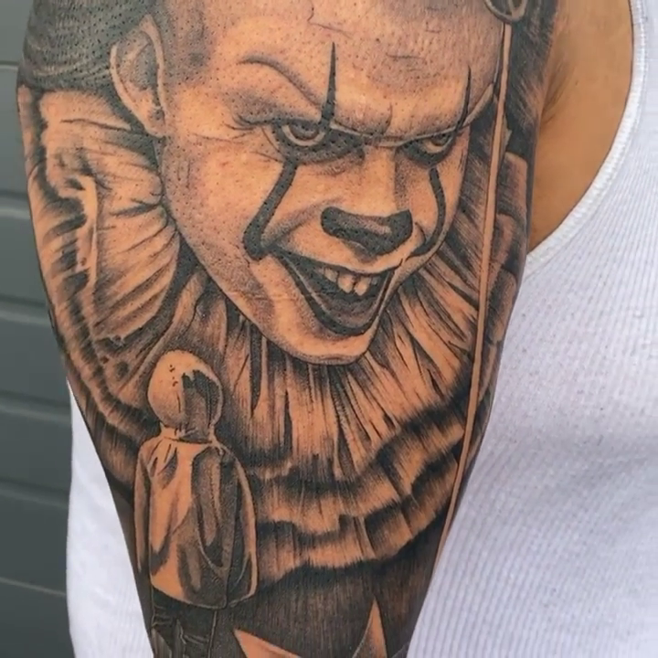 Pennywise the clown realism tattoo by Kyle Lopez, Union City, California