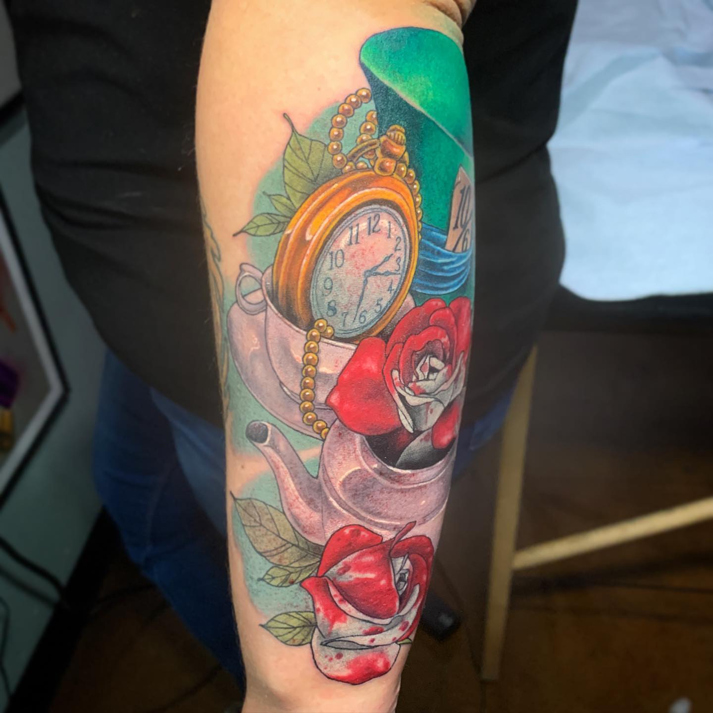 Teapot and roses new school tattoo on the forearm by Albuquerque Tattoo Artist, Albuquerque, New Mexico