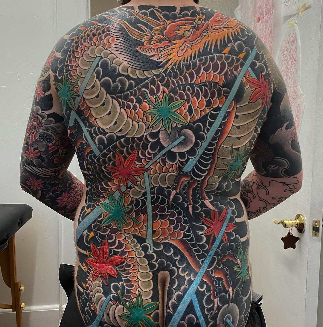 Dragon and maple leaves Japanese tattoo on the back by Kyle Mitchell, Cincinnati
