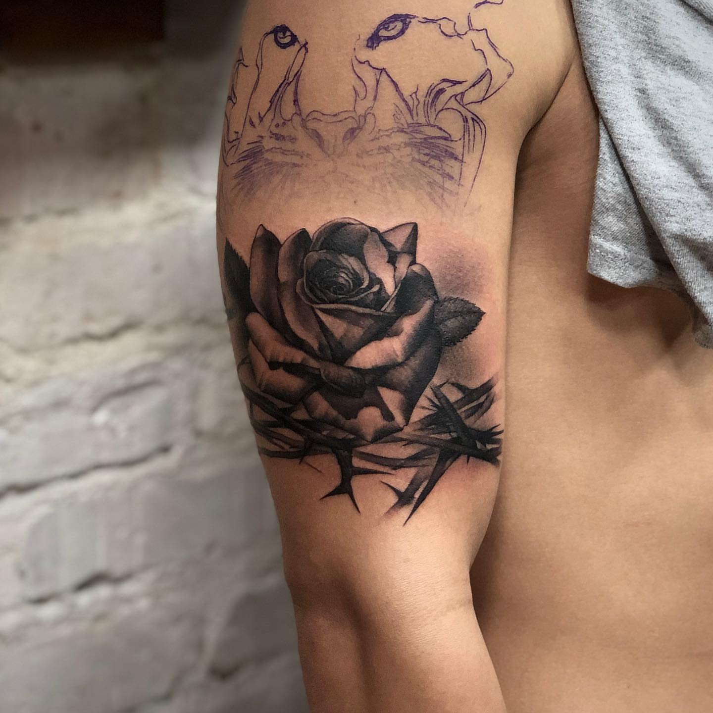 Rose with thorns realism tattoo on the forearm by Alejandro Rojas