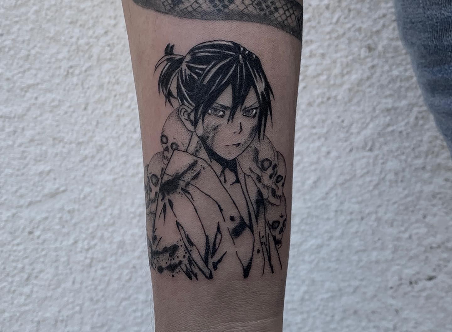 Anime character anime tattoo on the forearm by Jon Crook, Portland, Oregon