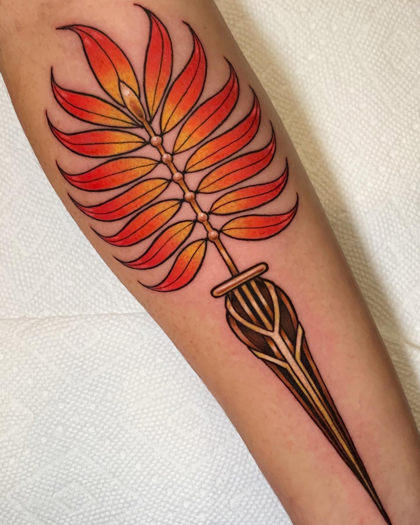 Floral arrangement dotwork tattoo on the forearm by Cortney Norton