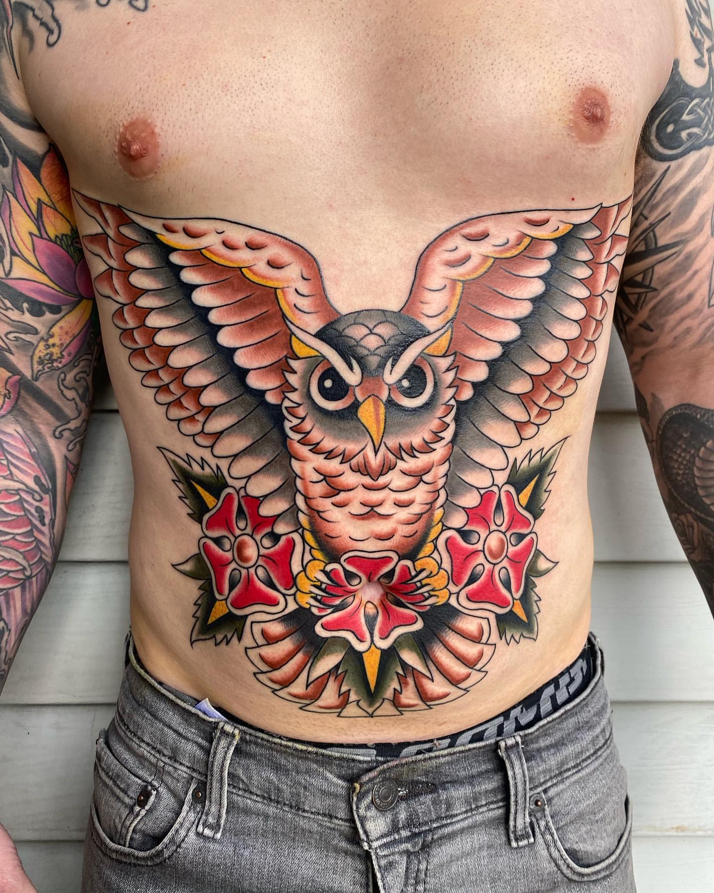 Owl American traditional tattoo on the torso by Daniel Mesen