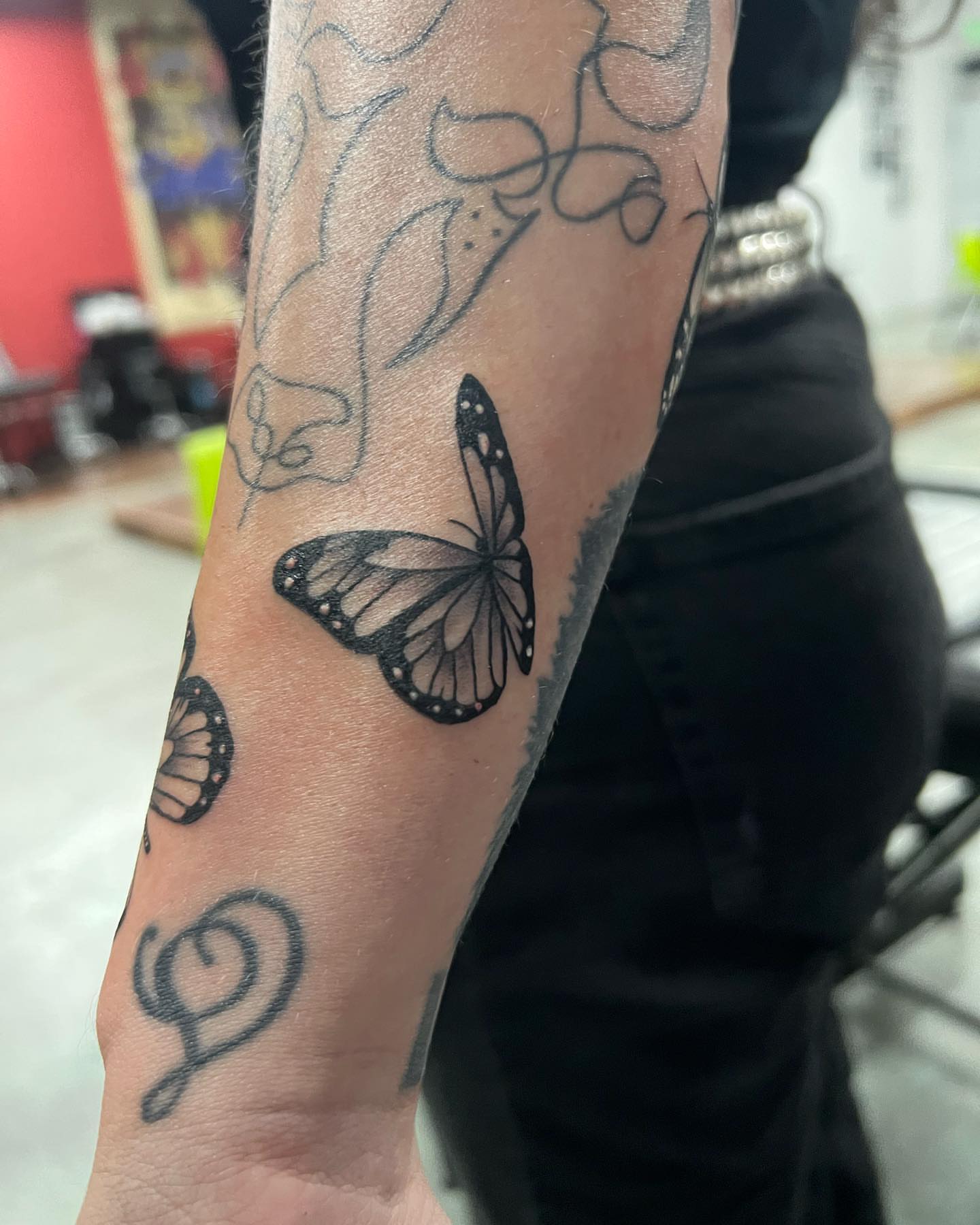 Butterfly black and grey tattoo on the forearm by CHiNO iNKs