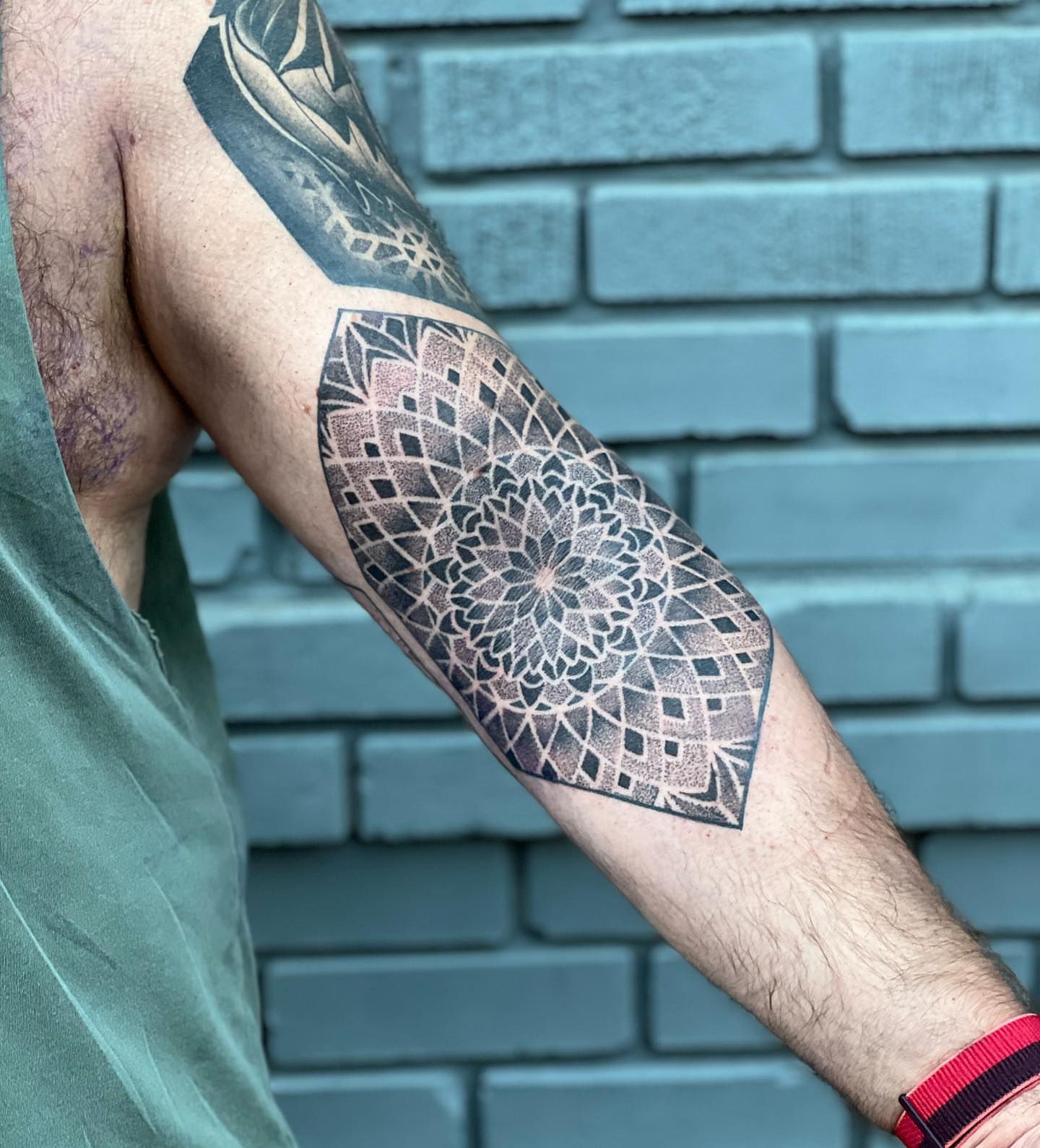 Geometric mandala geometric tattoo on the forearm by Ałex, Portland, Oregon
