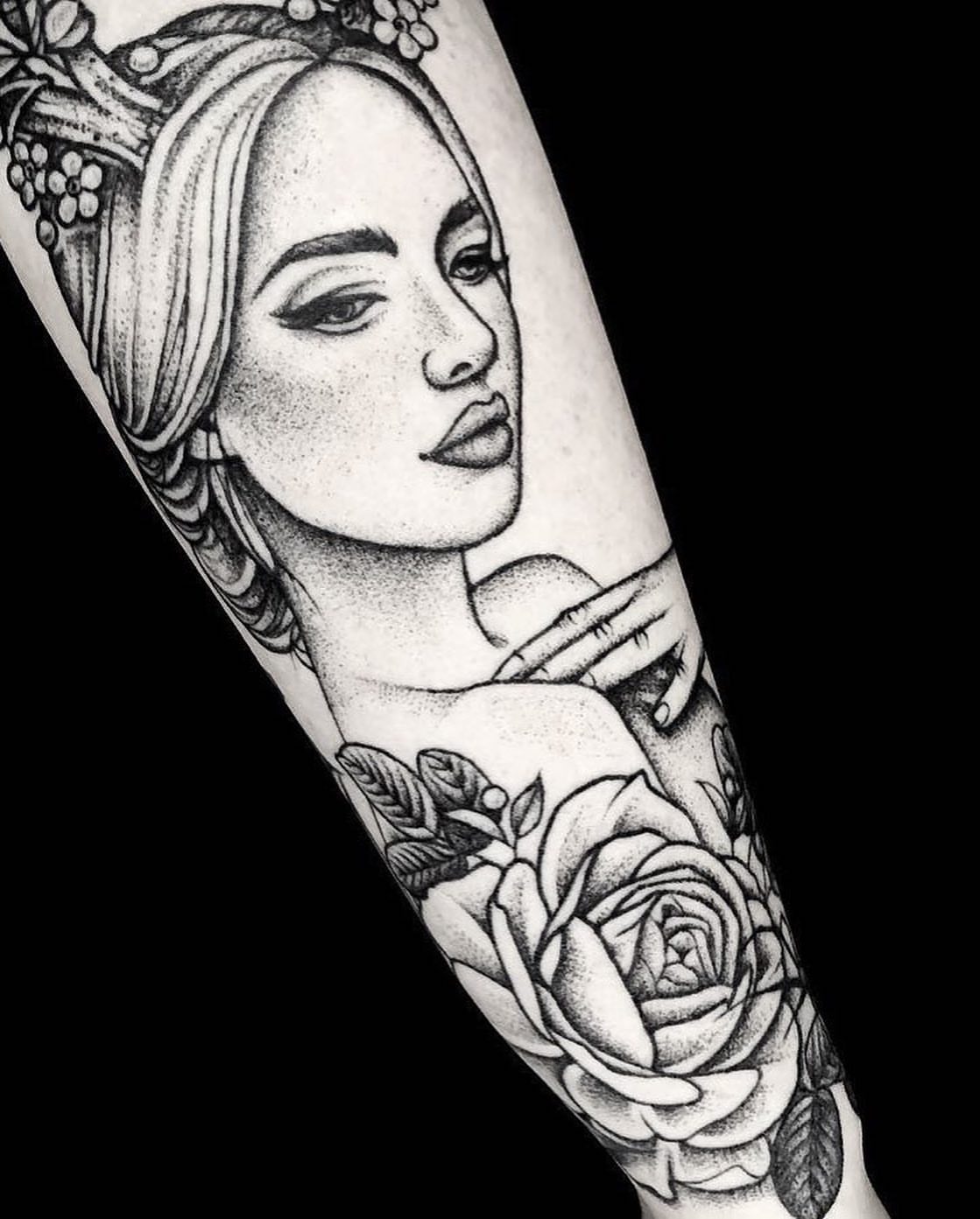 Woman with roses dotwork tattoo on the forearm by Ruby Gore, Portland, Oregon