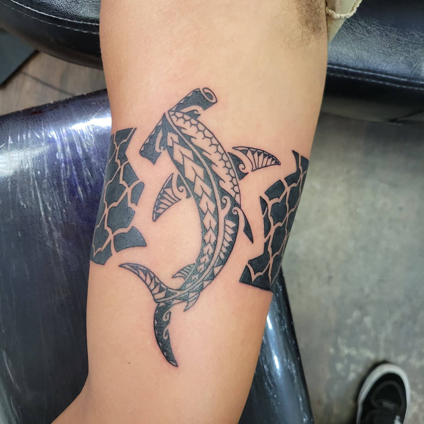 Shark tribal tattoo on the forearm by Douglas