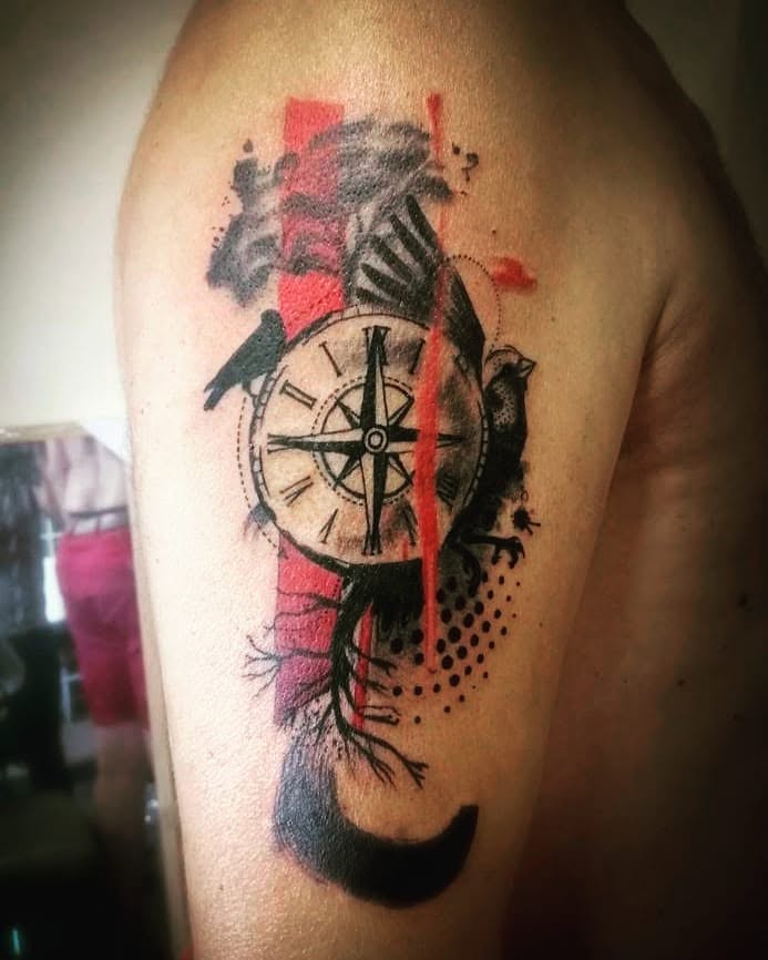 Compass and birds dotwork tattoo on the shoulder by Sonia
