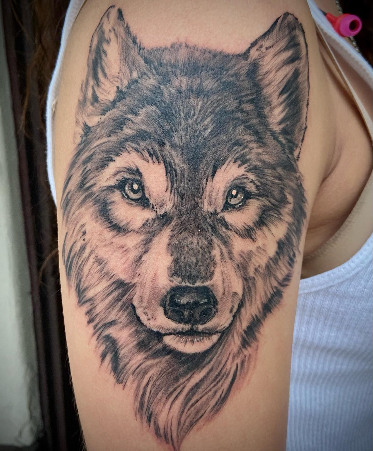 Wolf realism tattoo on the shoulder by Culleton Paramore