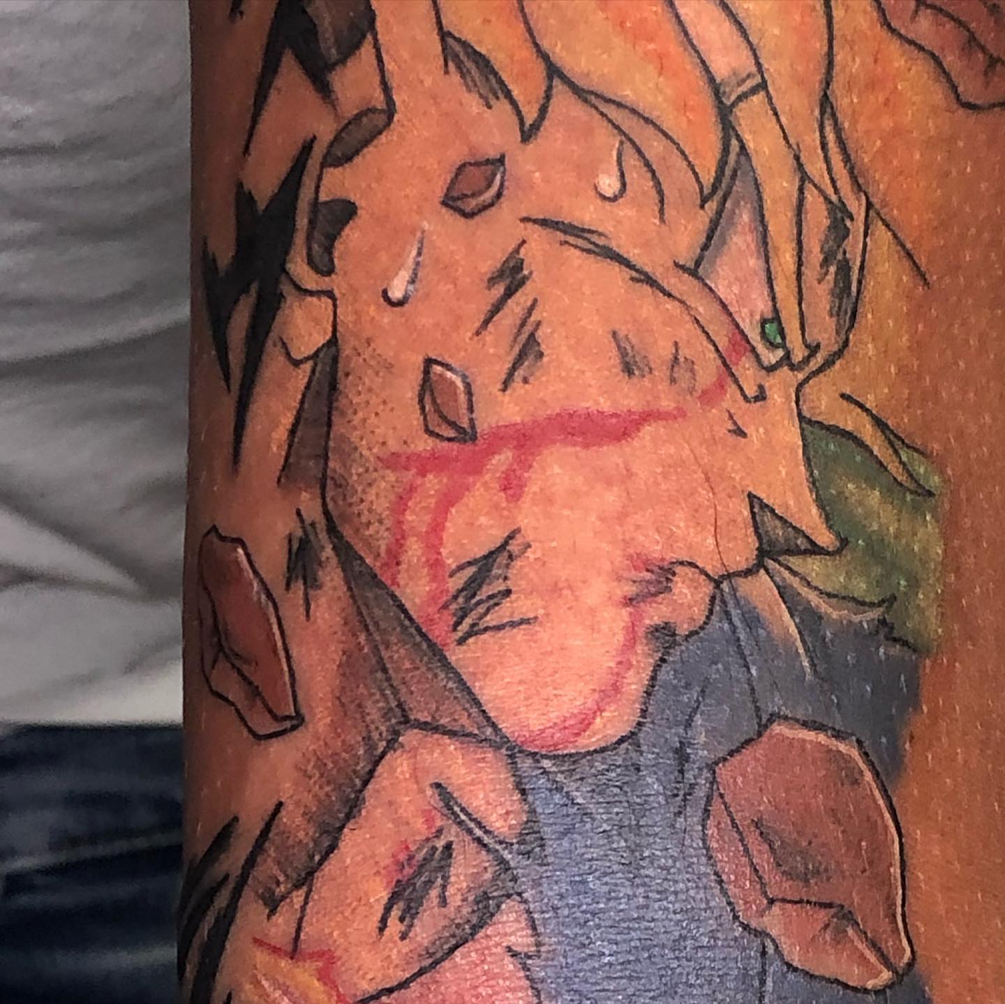 Anime character anime tattoo on the forearm by Dre Inks