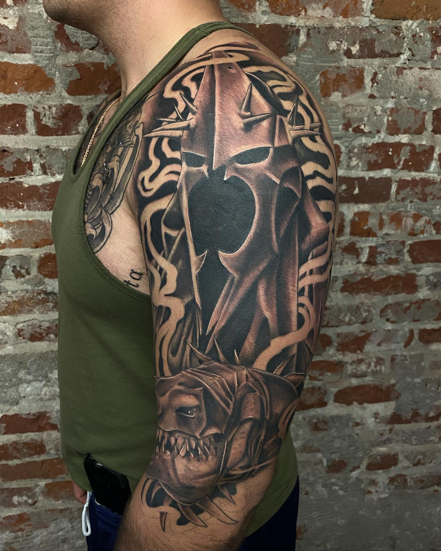 Tattoo by @nickbridwelltattoo — dark_realism, black_and_grey
