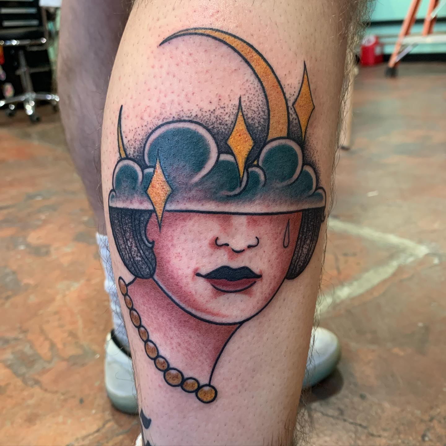 Woman's face with cloud hat dotwork tattoo on the forearm by M.zopfi - Tattoo Artist