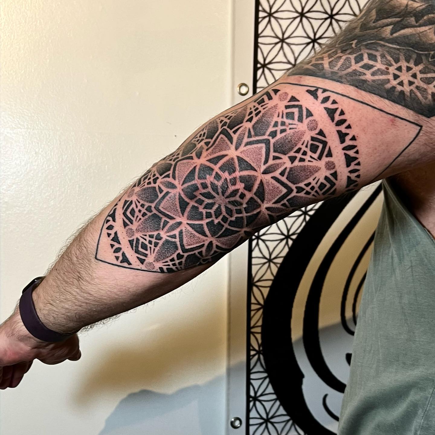 Geometric mandala geometric tattoo on the forearm by Ałex, Portland, Oregon