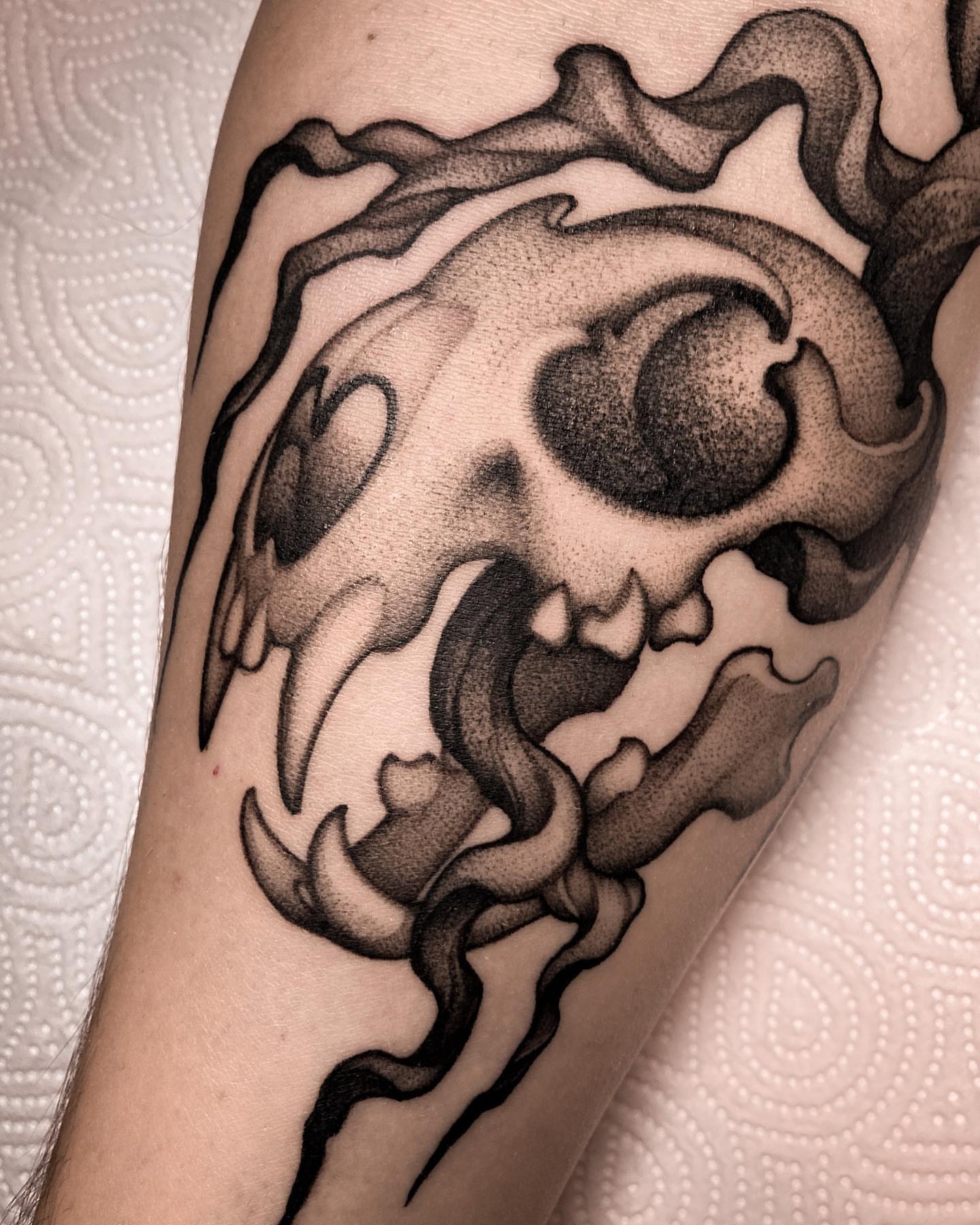 Skull dotwork tattoo on the forearm by Tattoo artist in Charlotte,NC