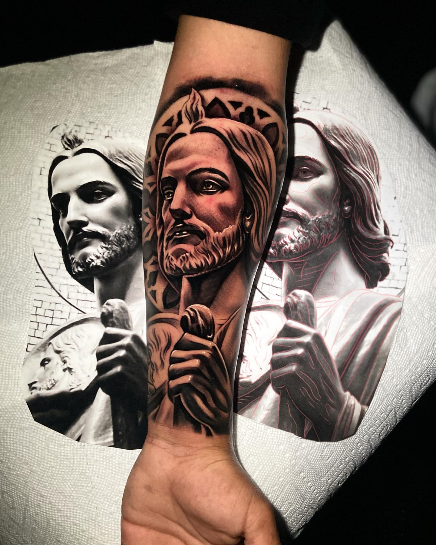 Religious figure realism tattoo on the forearm by eksoe_