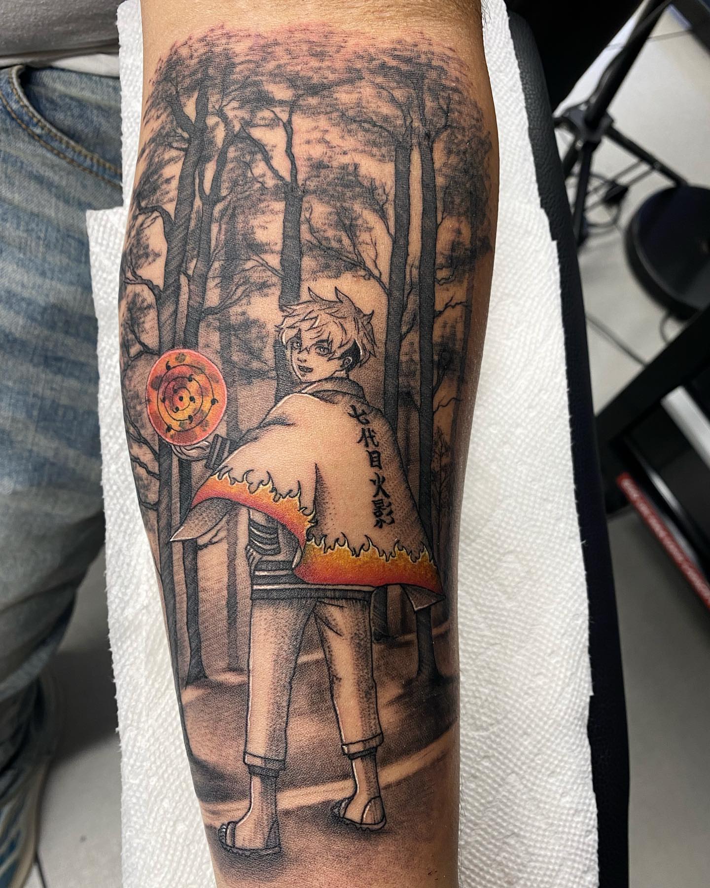 Anime character with forest background anime tattoo on the forearm by Dayana✨