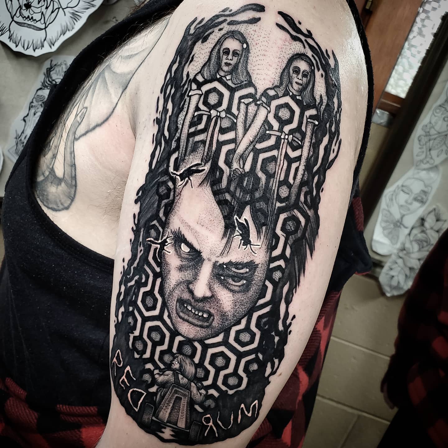 The Shining dotwork tattoo on the shoulder by Kyle Black