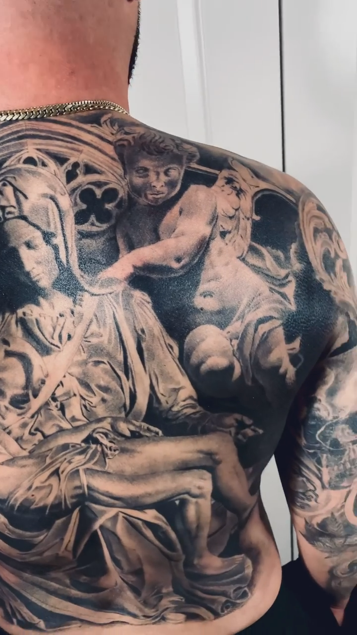 Pietà sculpture realism tattoo by Carlos Macedo Tattoo