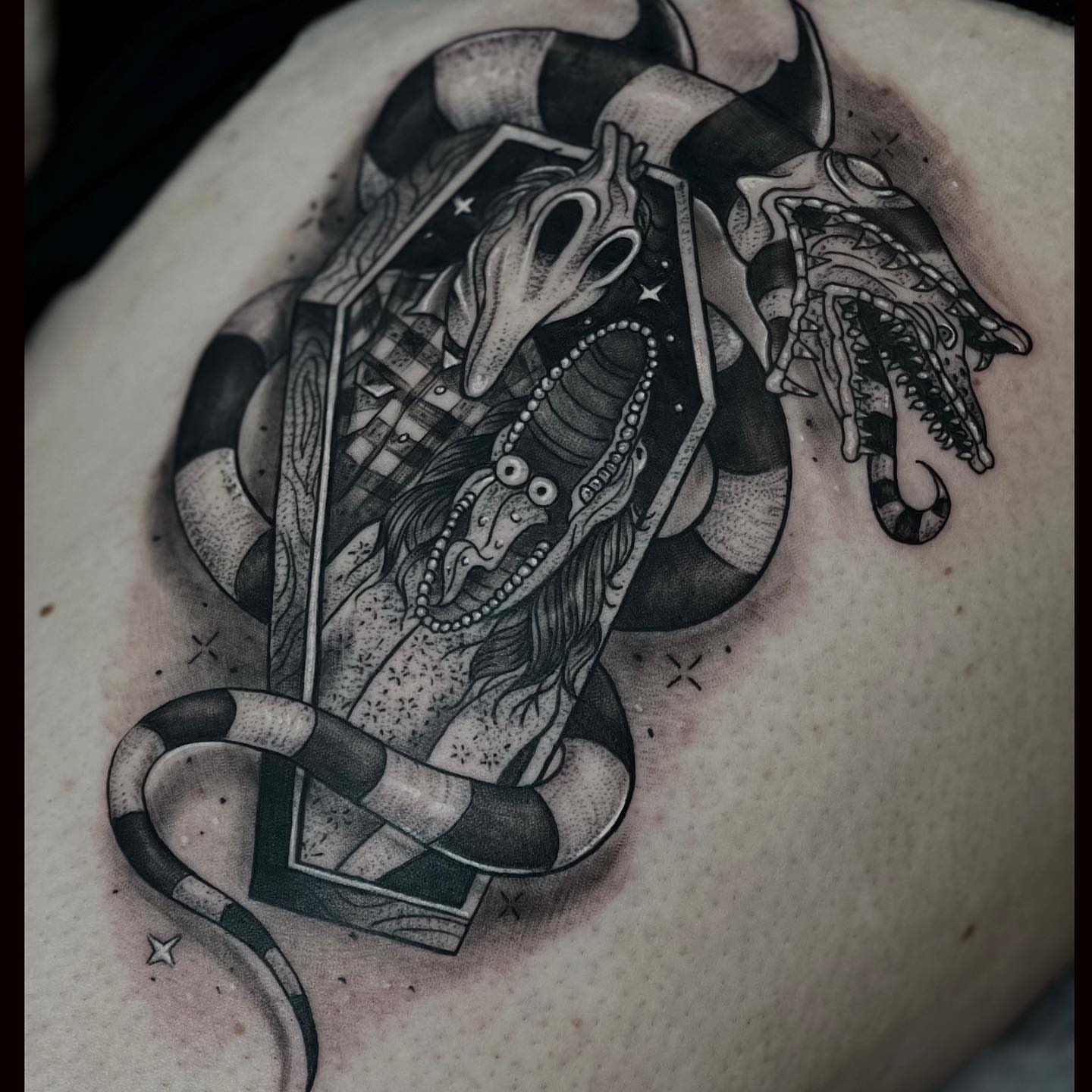 Snake and woman American traditional tattoo on the shoulder by Aaron Watson