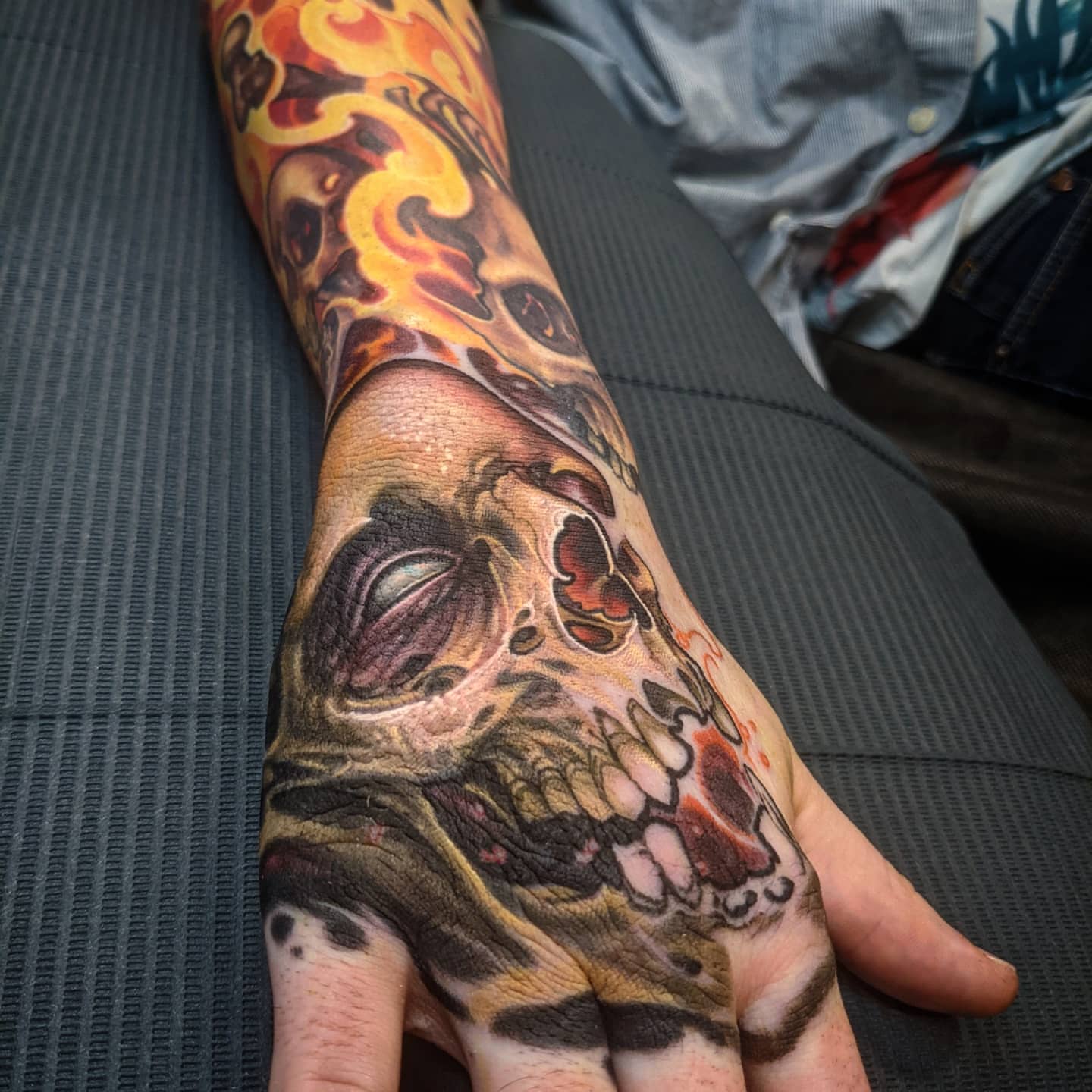 Skull realism tattoo on the hand by Matt Driscoll